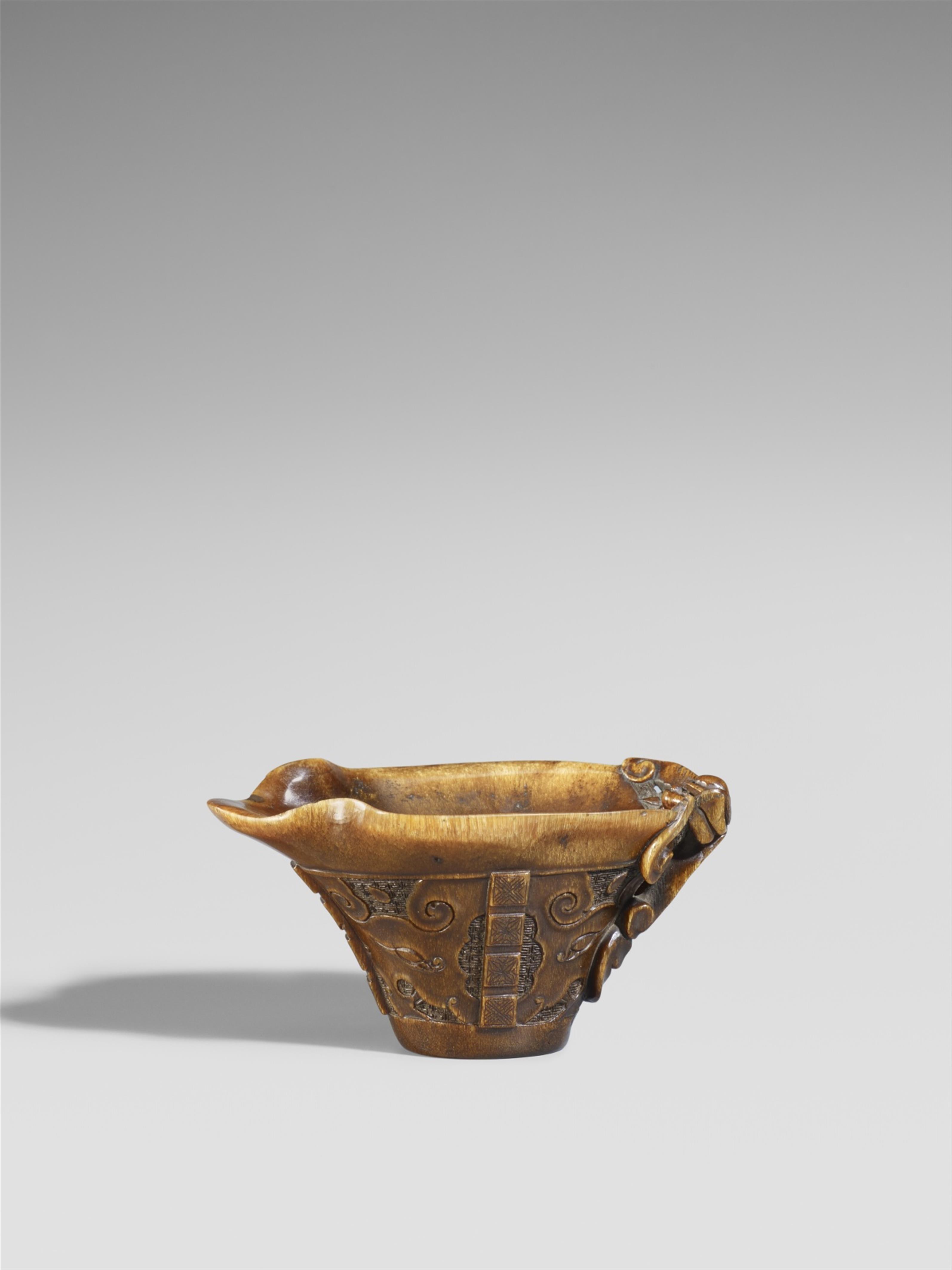 A libation cup of rhinocerous horn. 19th/20th century - image-1