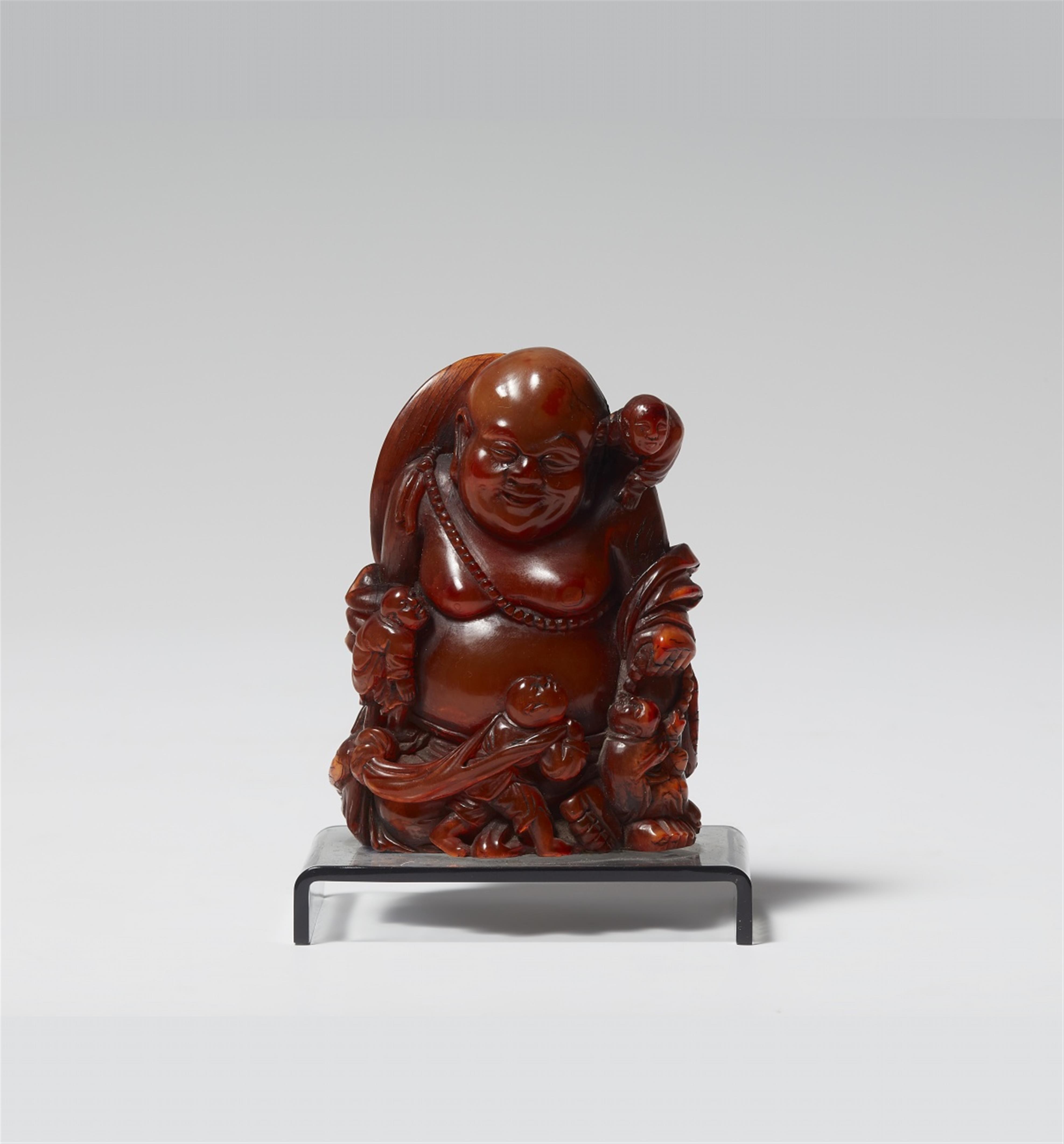 A horn carving of Hotei and children. Qing dynasty - image-1