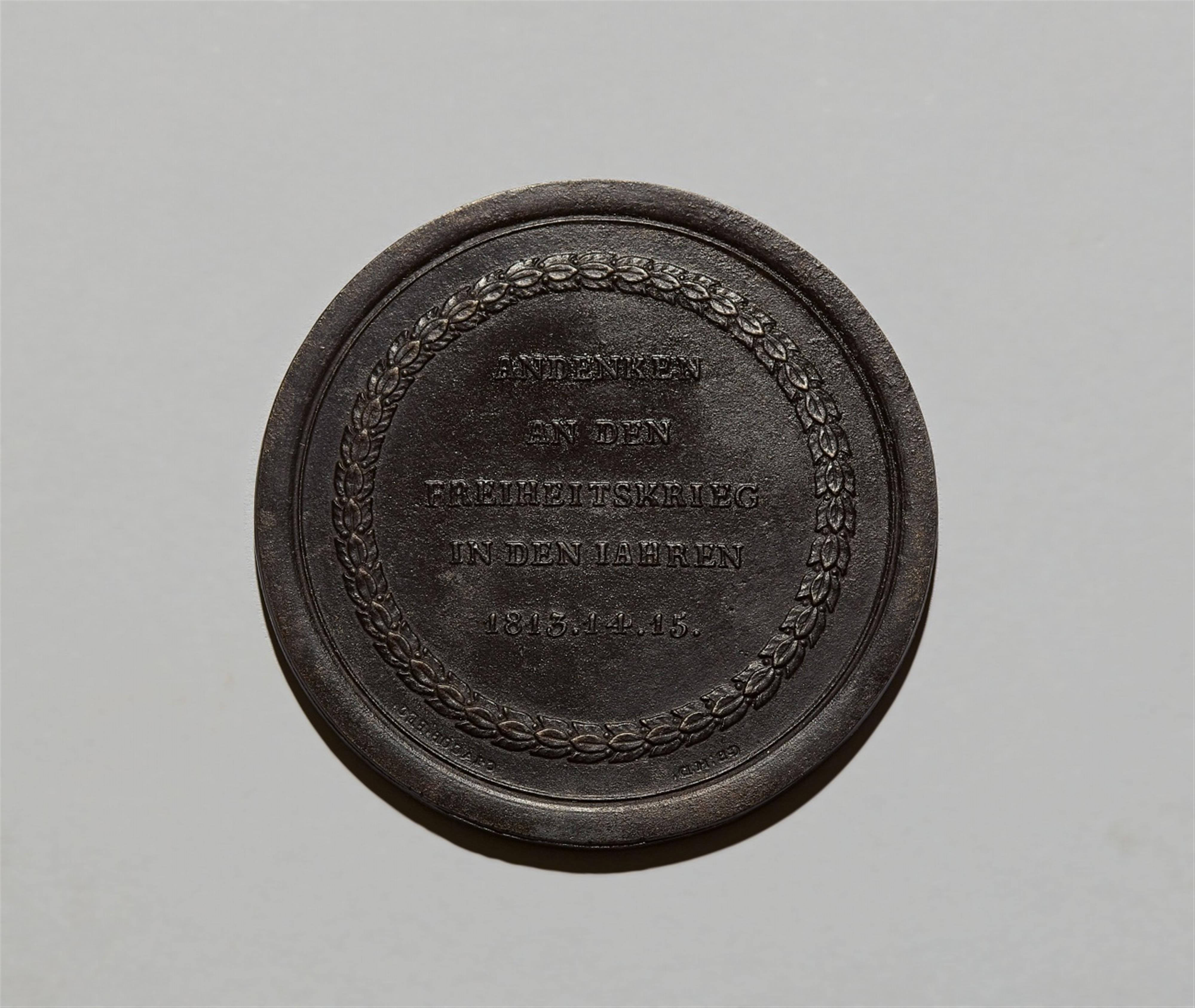 A cast iron medallion commemorating the German Campaign - image-2