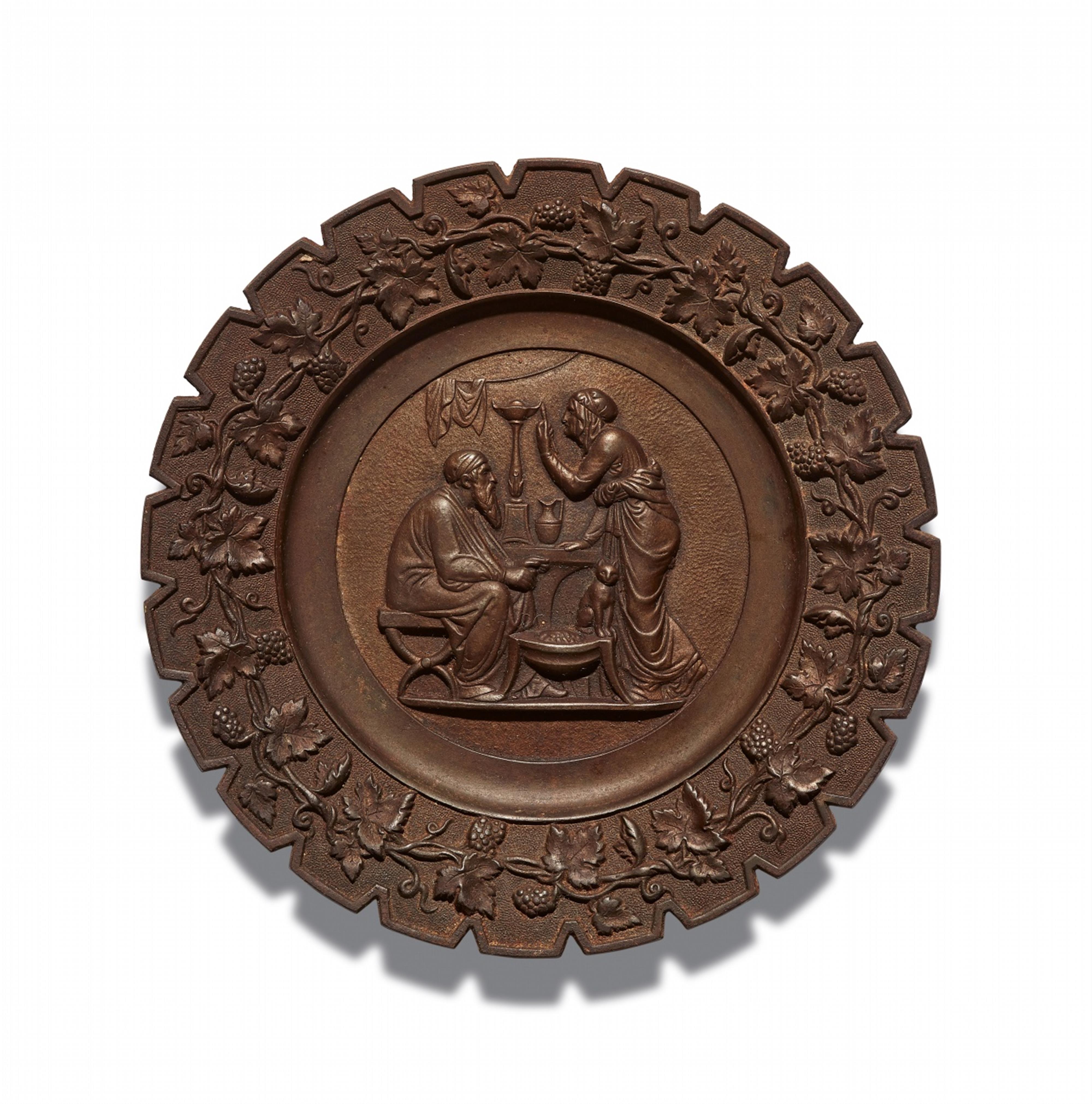 A cast iron plate with an allegory of winter - image-1