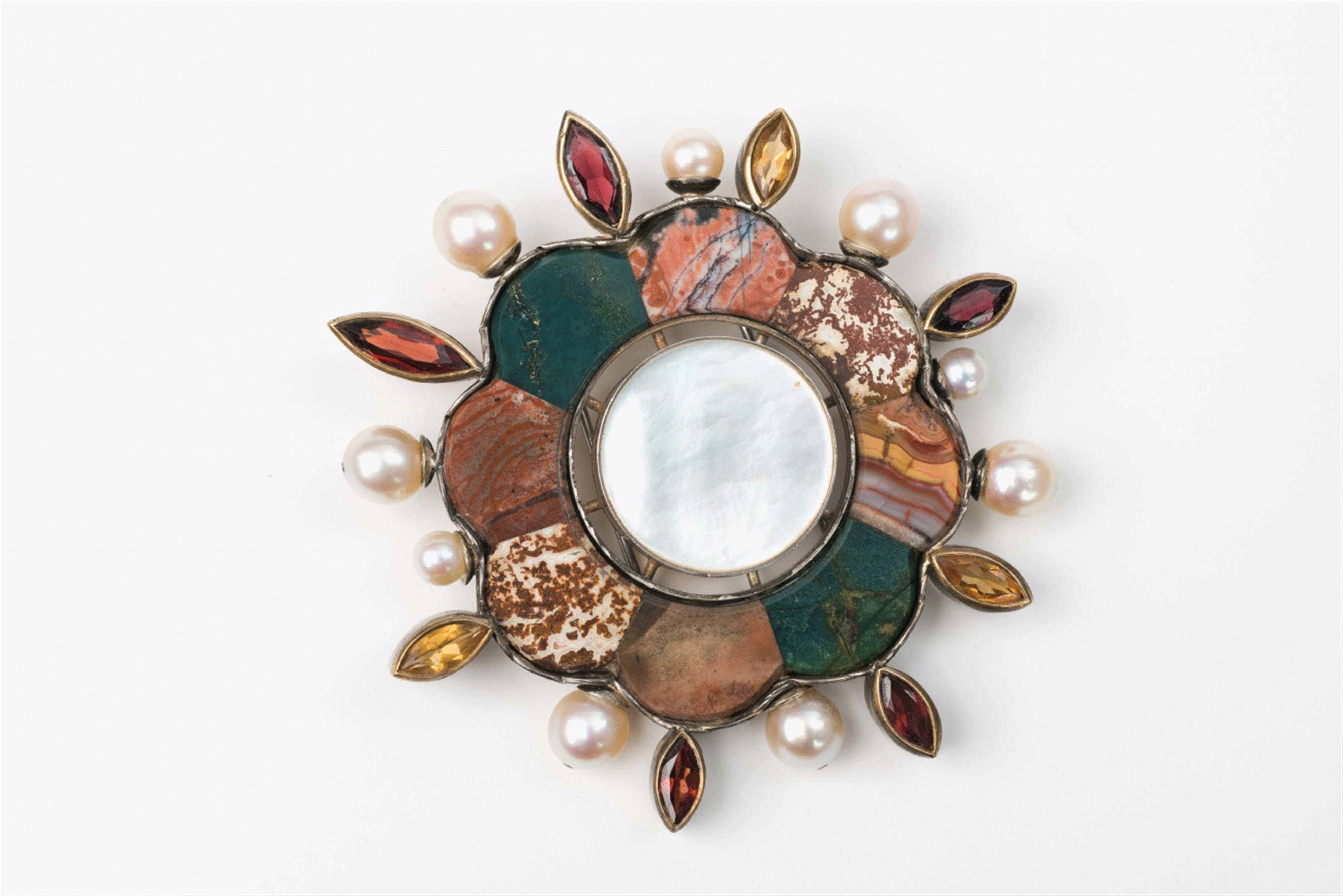 A silver and hardstone mosaic brooch - image-1