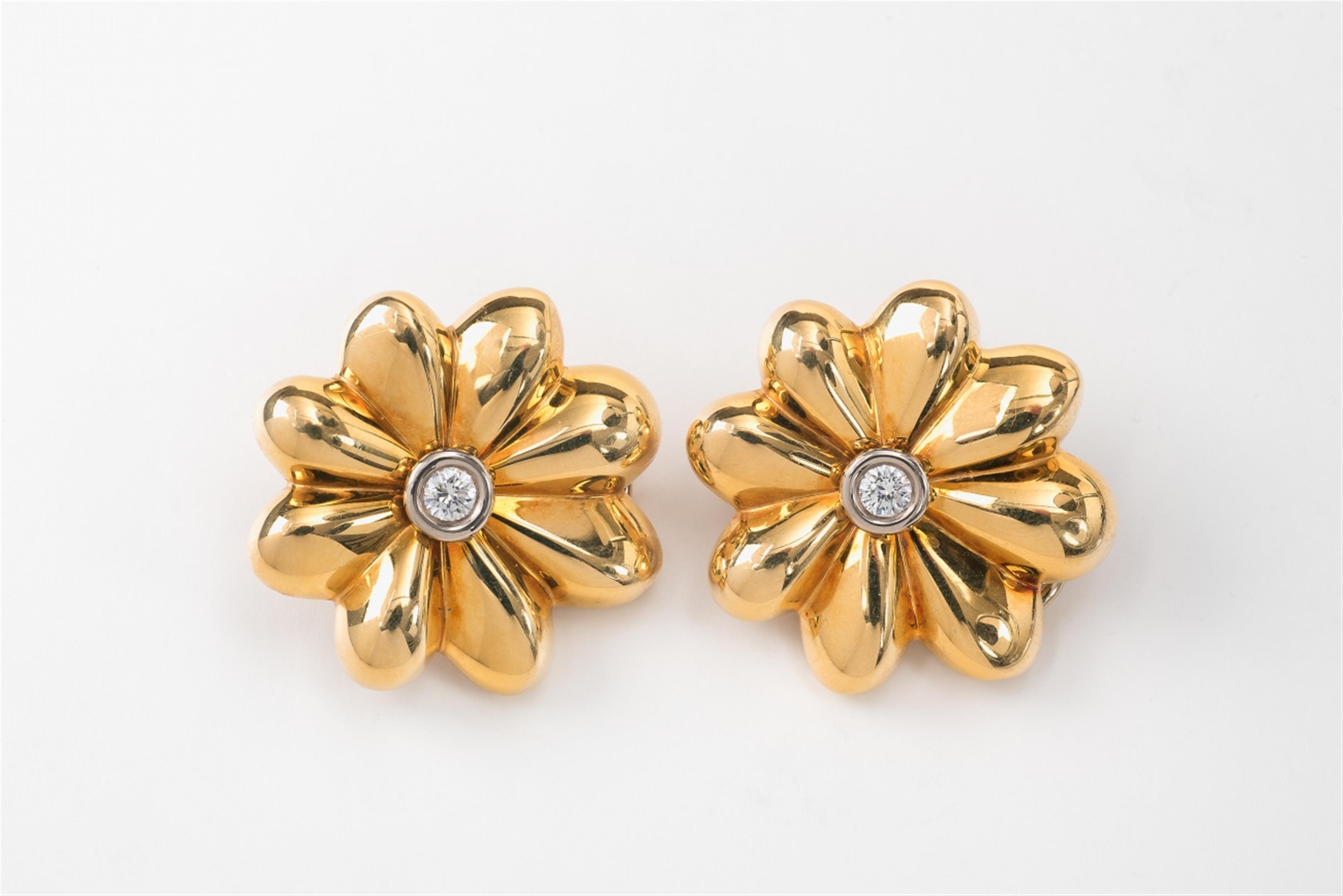 A pair of 18k gold and diamond flower clip earrings - image-1