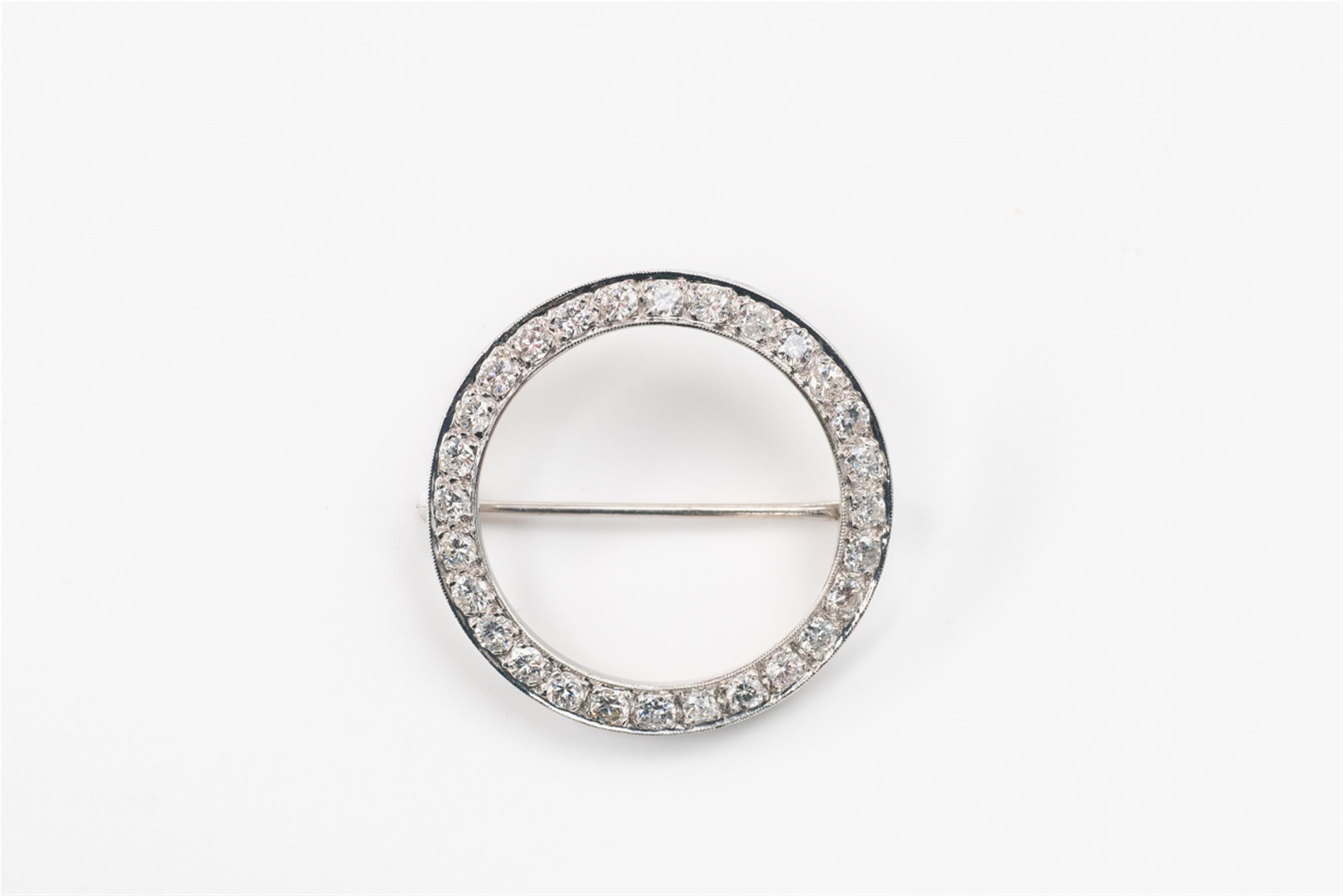 An 18k white gold and diamond brooch - image-1