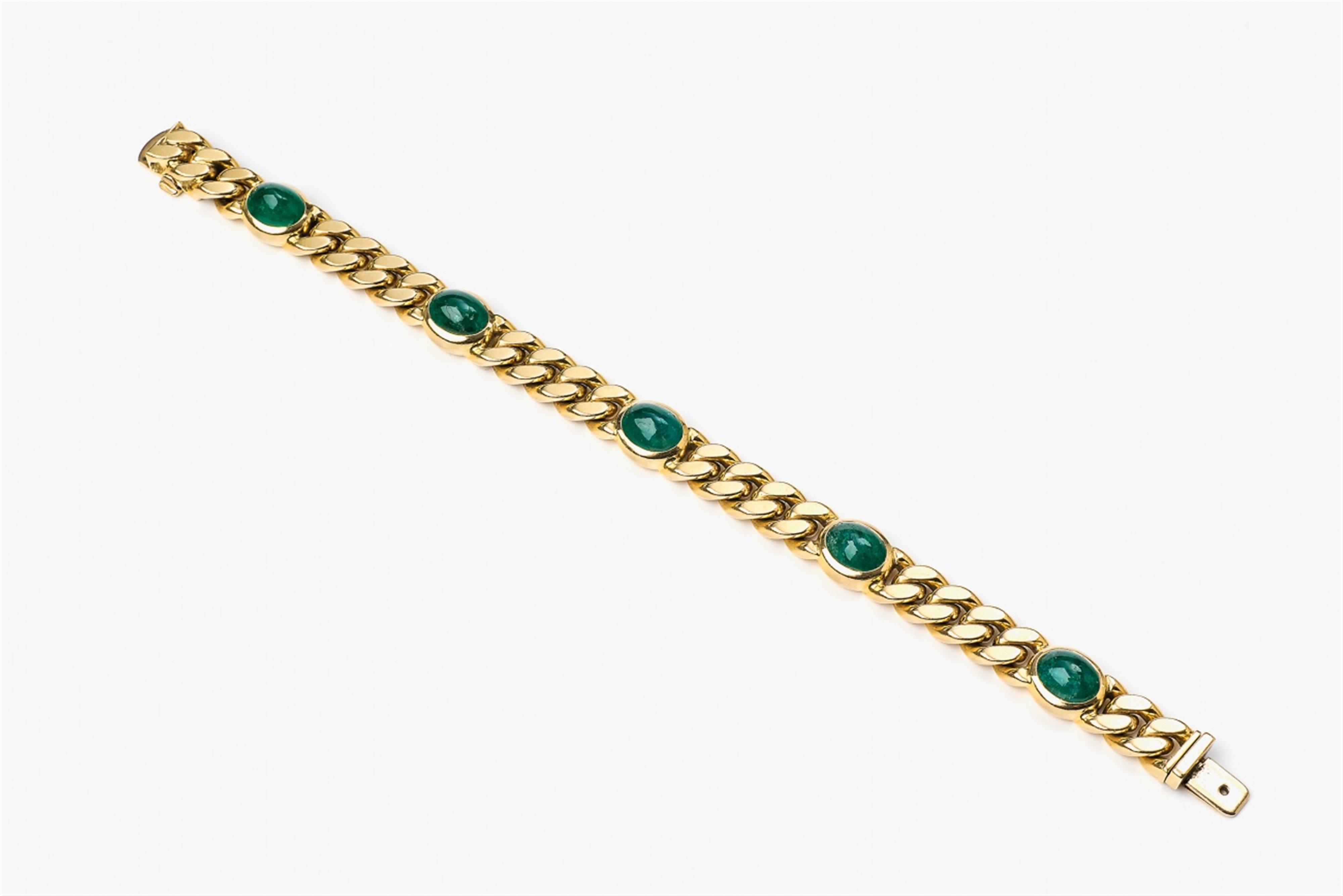 An 18k gold and emerald bracelet - image-1