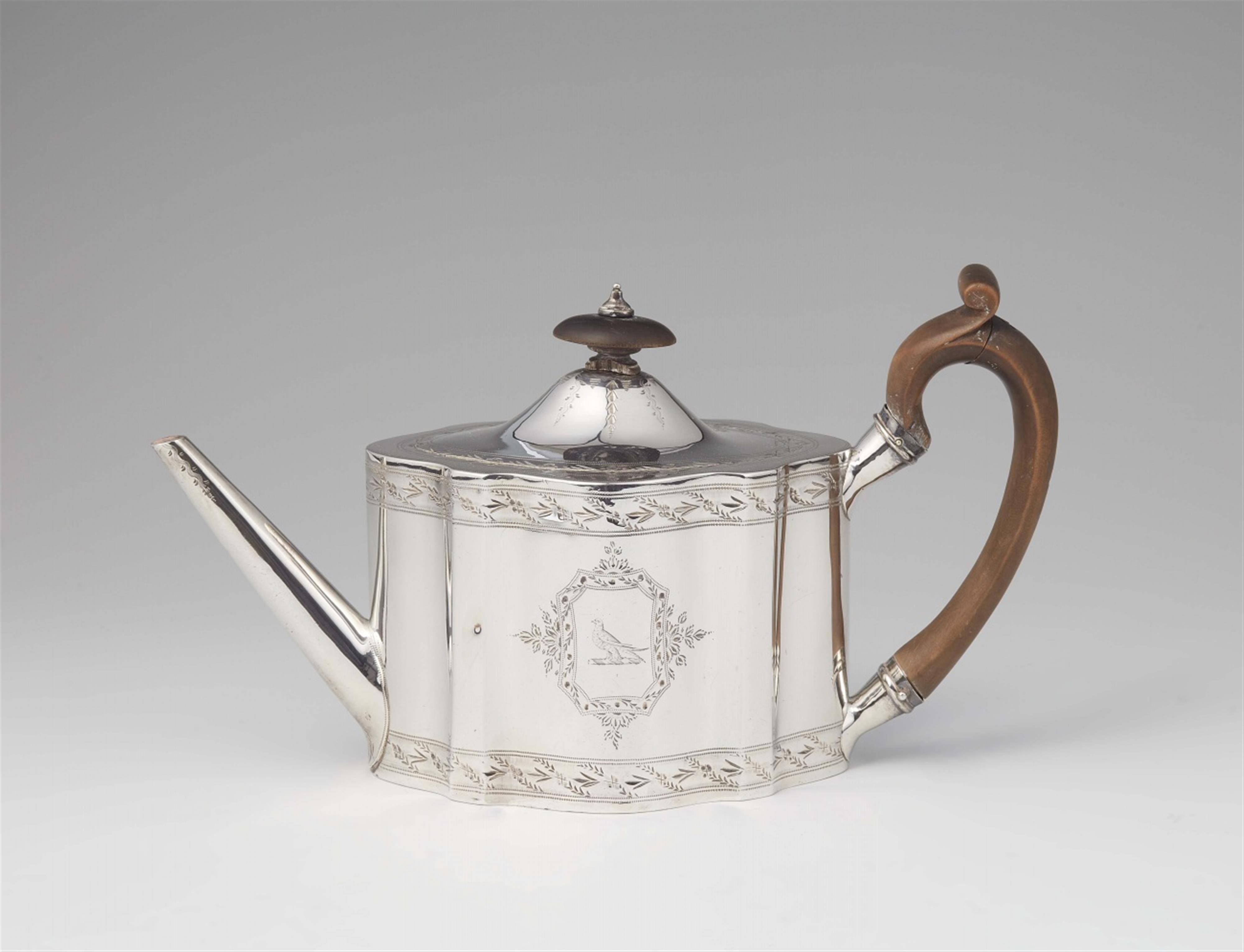 A George III silver teapot - image-1