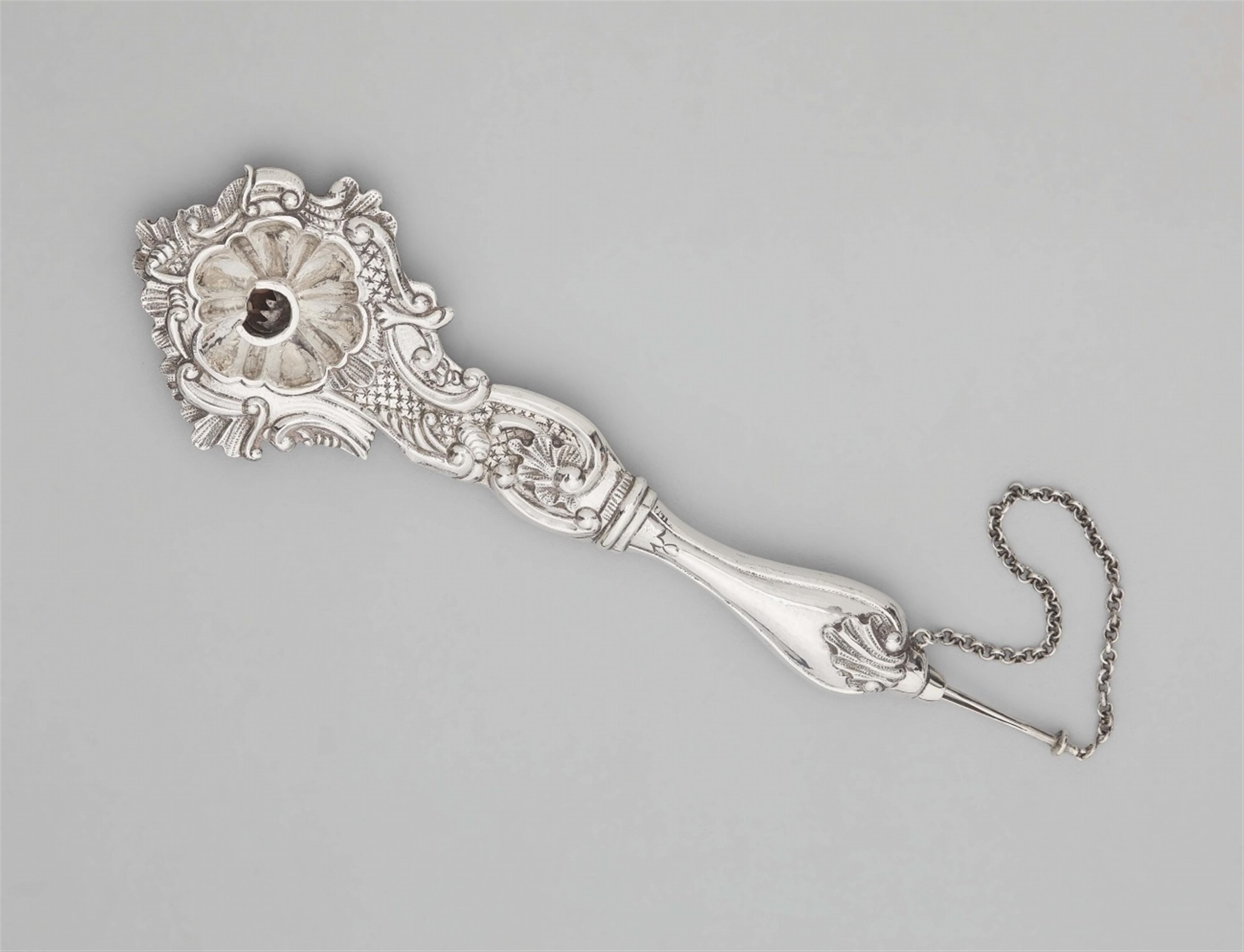 A silver chamberstick - image-1