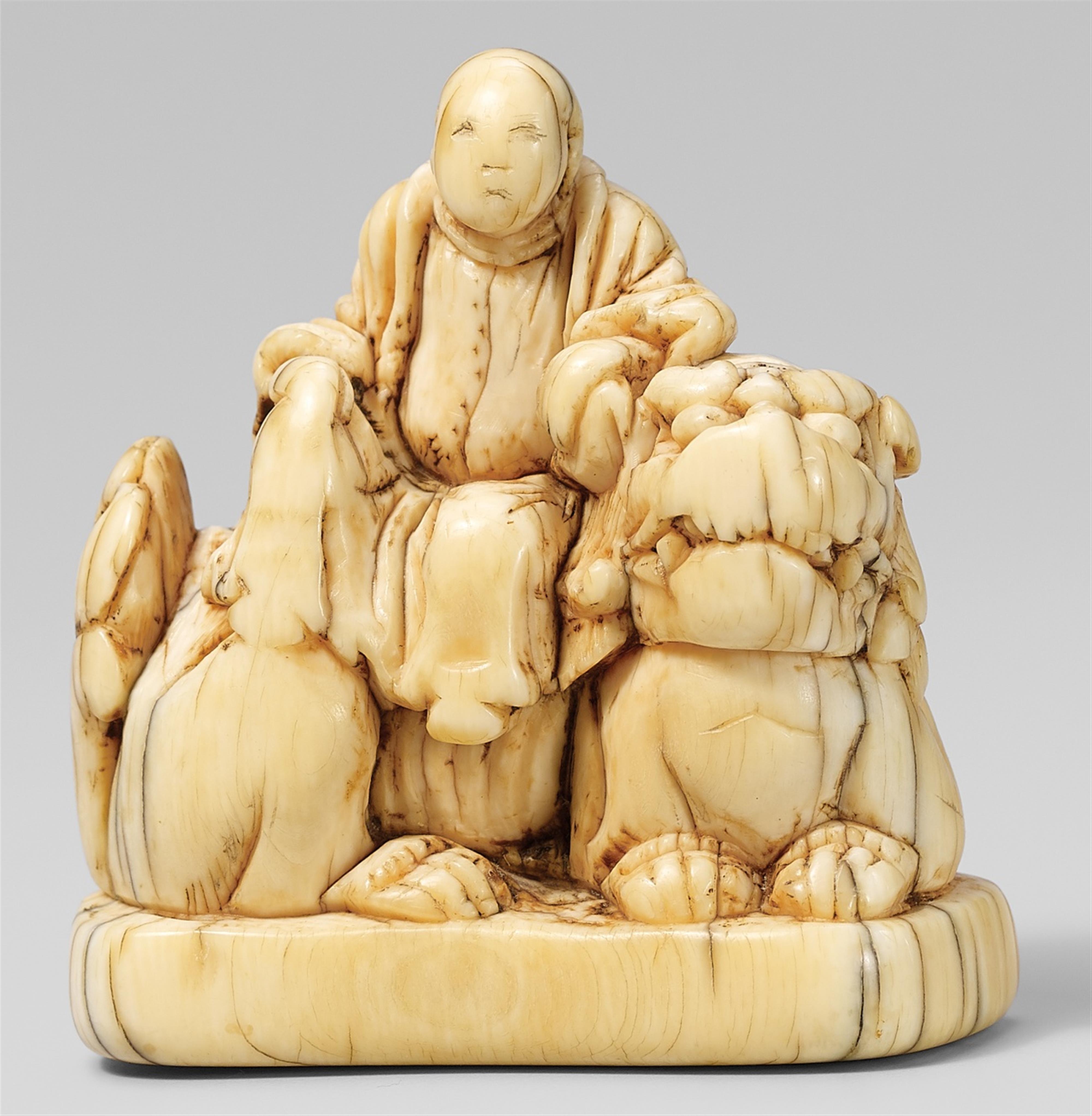 An ivory netsuke of a Chinese scholar. 18th century - image-1