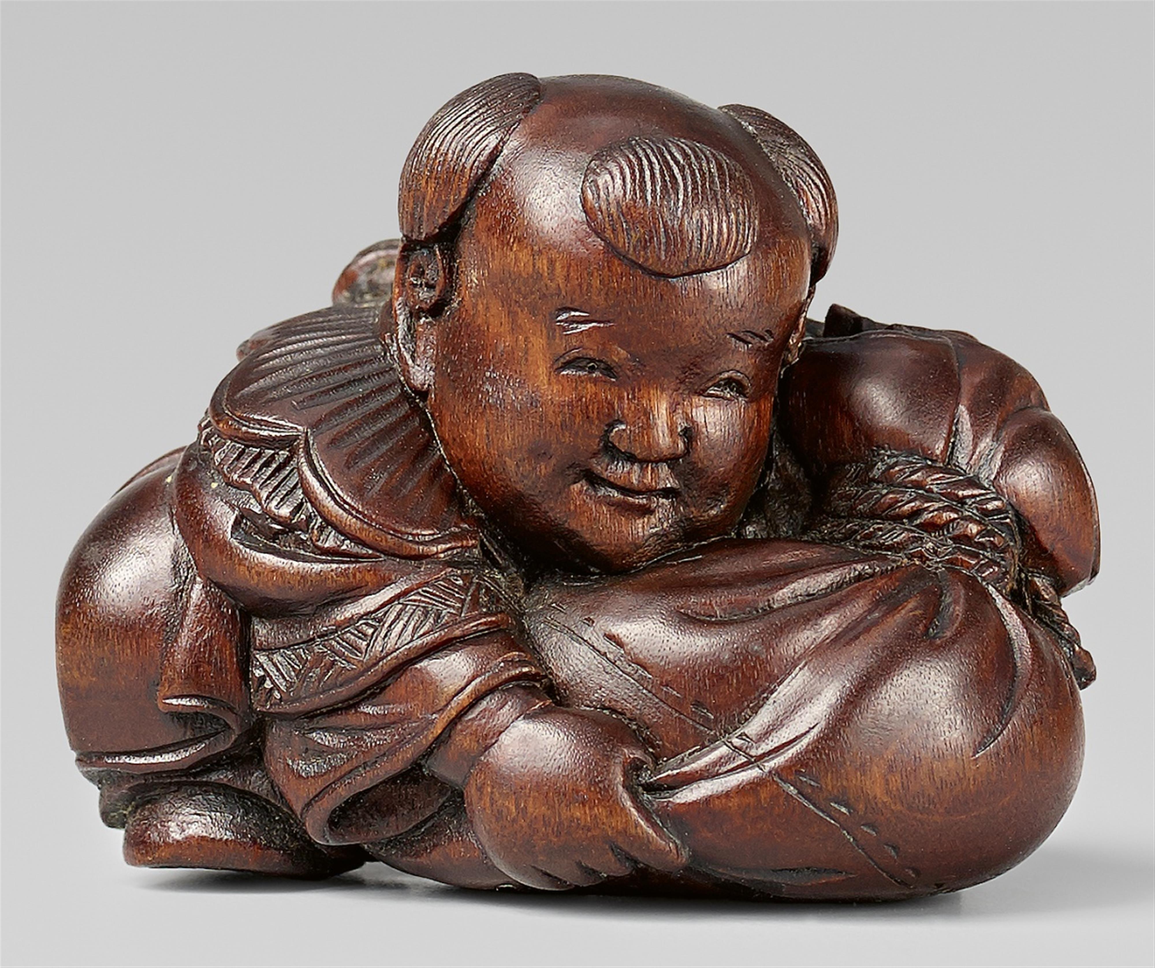 A wood netsuke of a karako with a bag, by Gyokusai. Mid-19th century - image-1