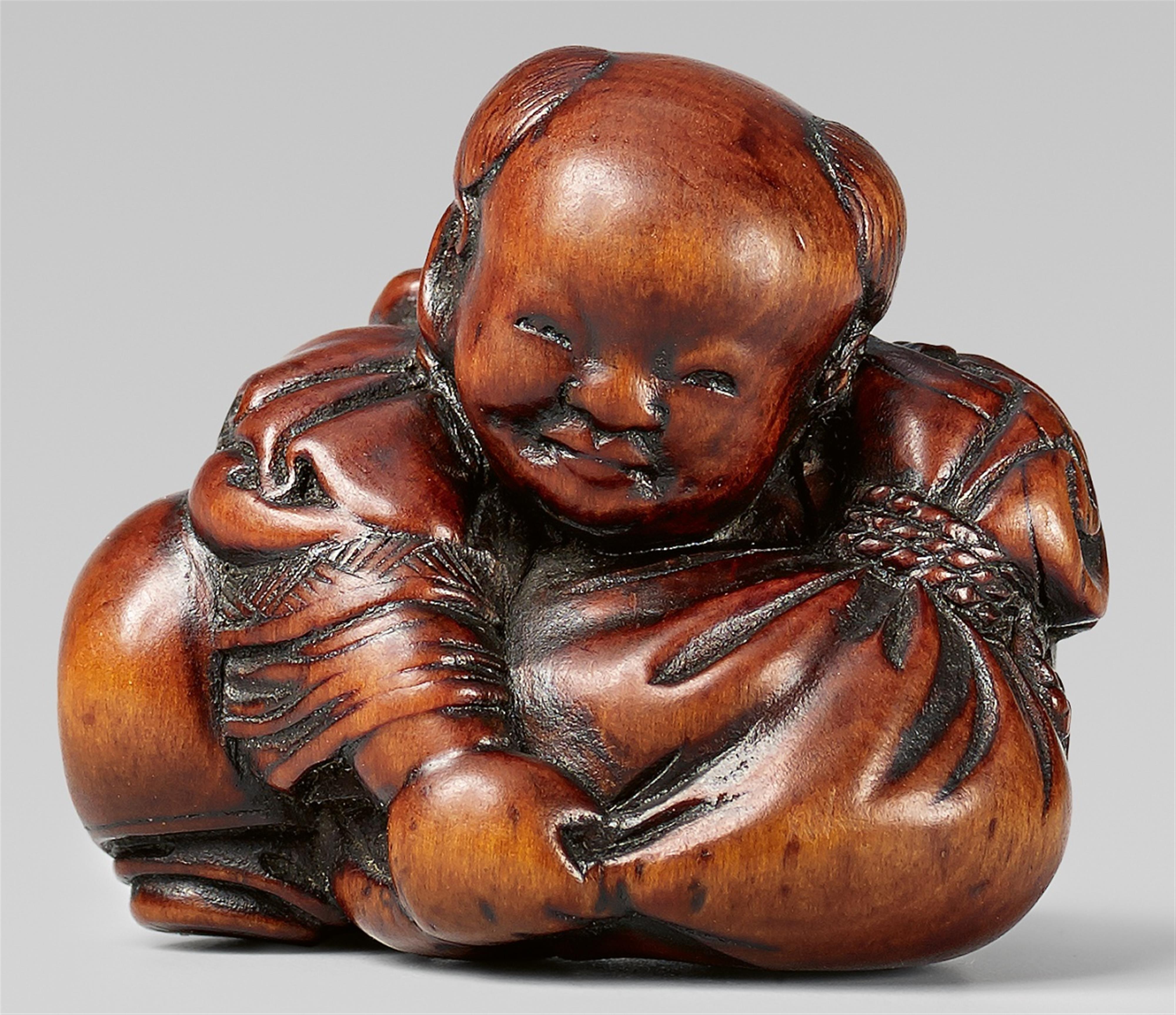 A boxwood netsuke of a karako with Hotei’s bag, by Bokusai. Mid-19th century - image-1