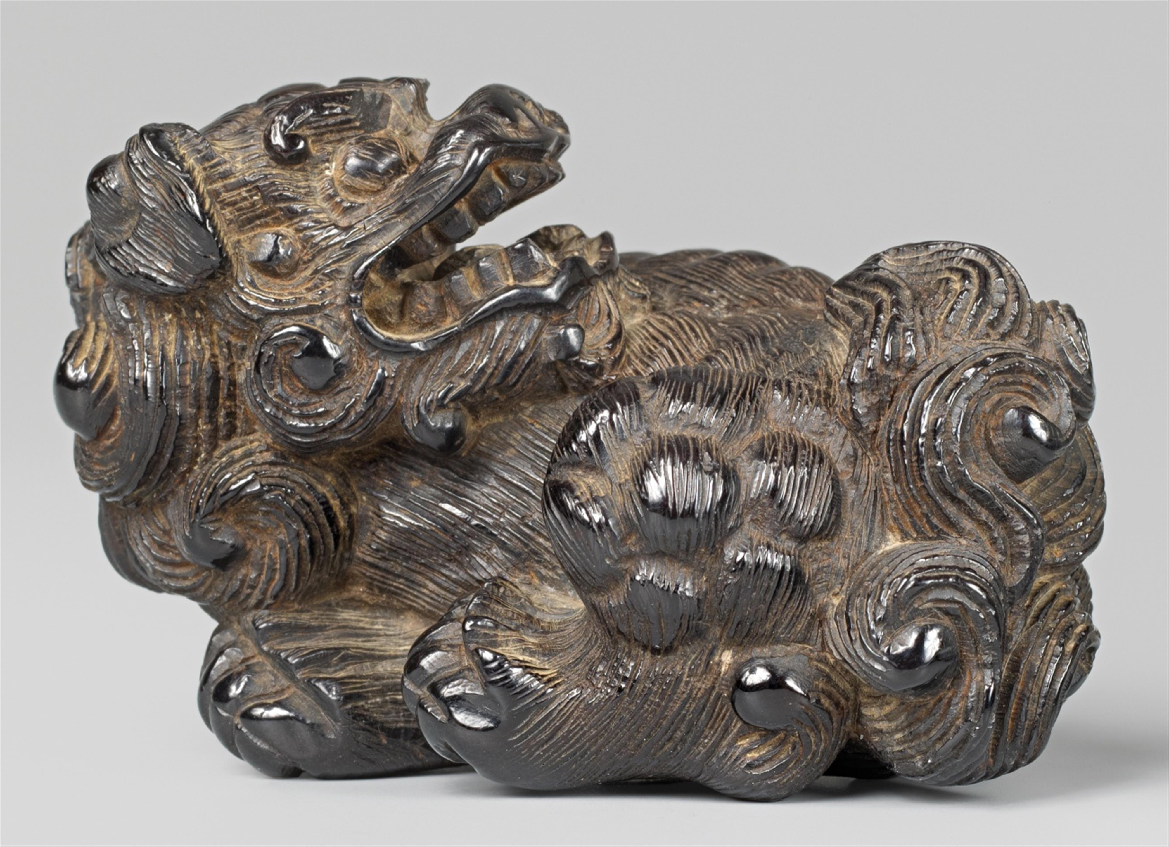 A very large synthetic material netsuke of a very large shishi. Late 19th century - image-1