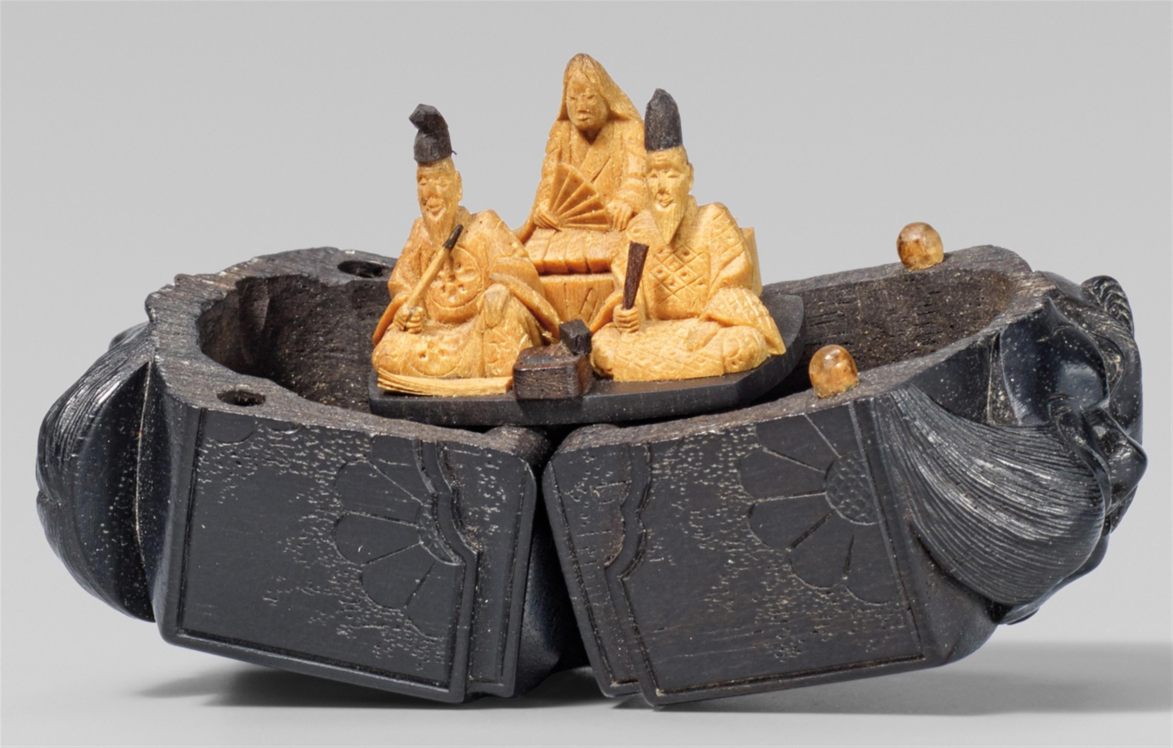 A fine black wood and light boxwood netsuke of a mask box, by Masayoshi. Mid-19th century - image-1