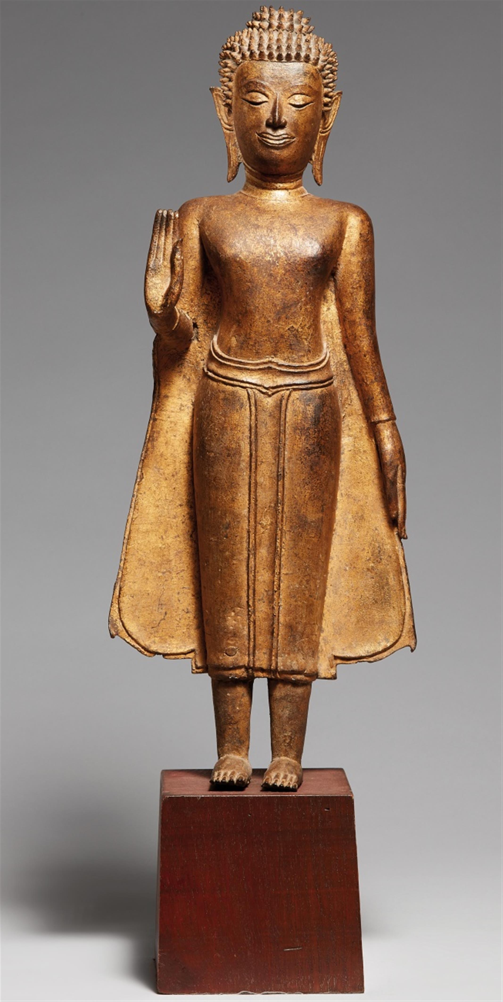 An Ayutthaya gilt bronze figure of a standing Buddha Shakyamuni. Thailand.16th/17th century or later - image-1