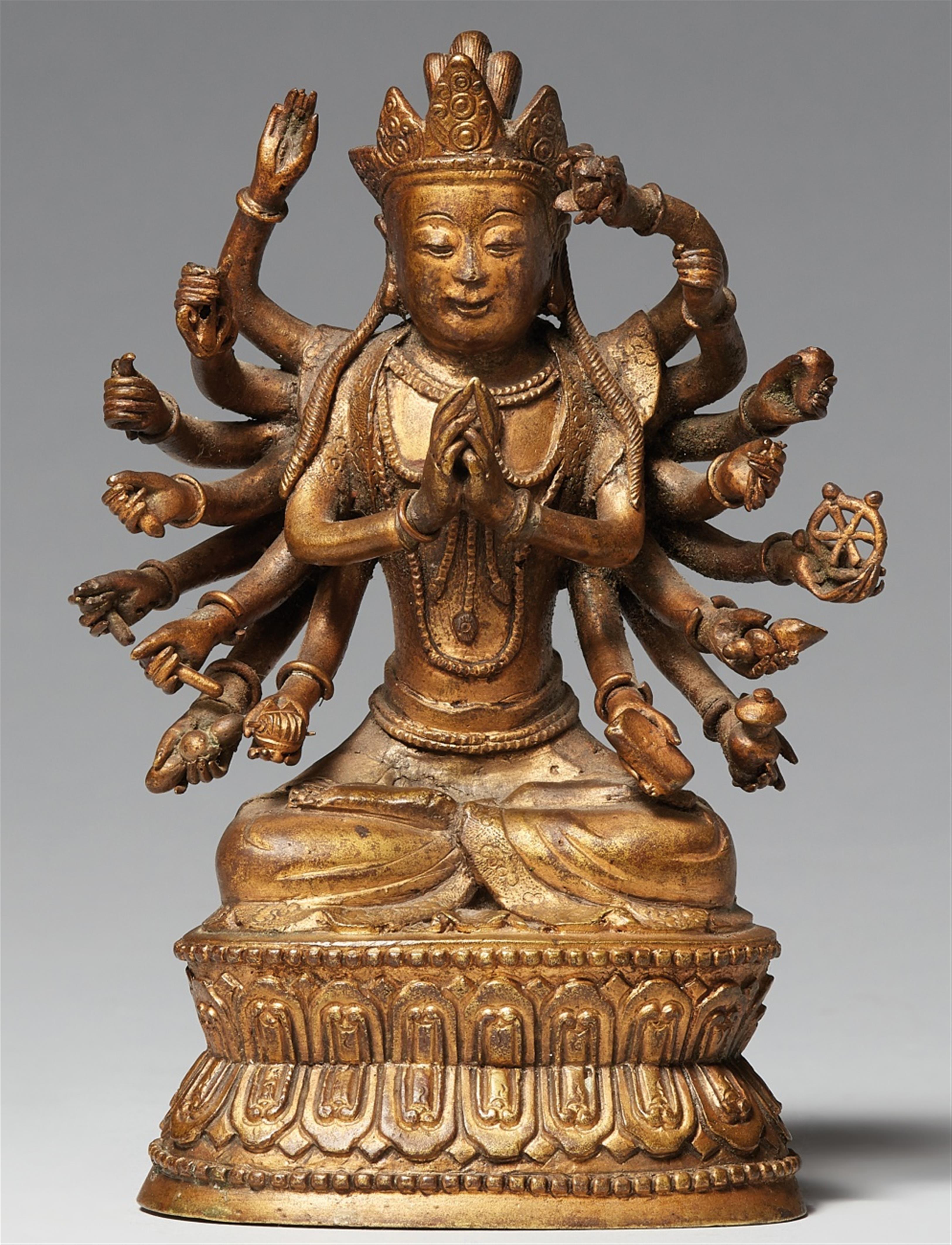 A thinly gilt bronze figure of an eighteen-armed Guanyin. 19th century - image-1