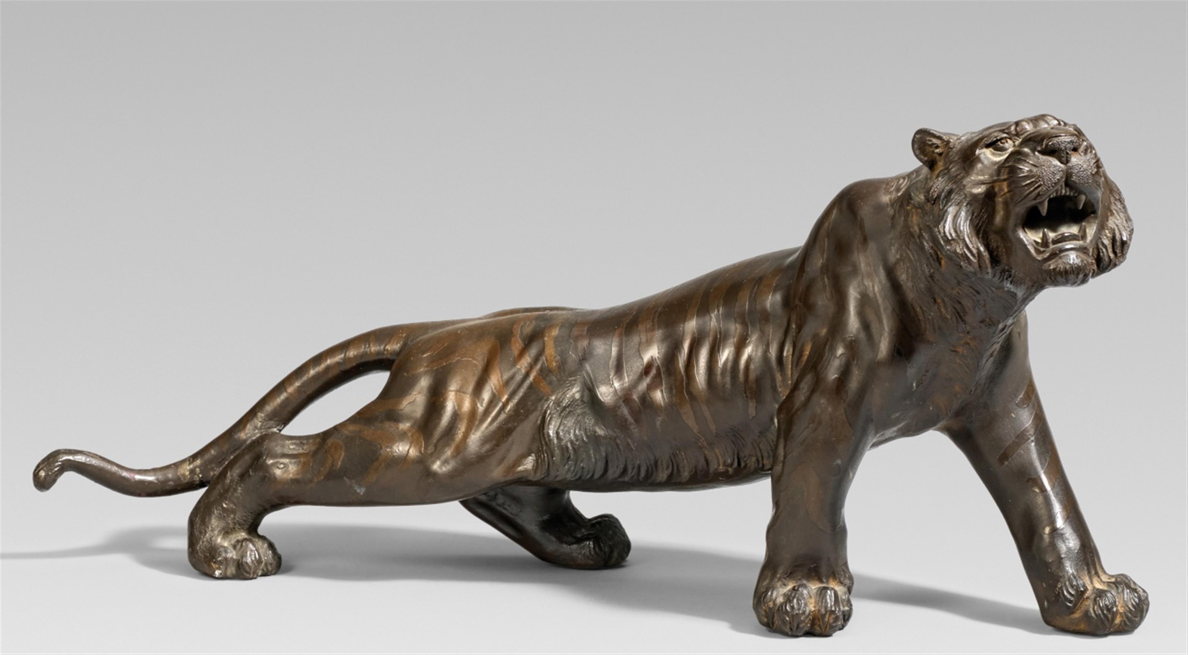 A bronze figure of a striding tiger. Late 19th century - image-1