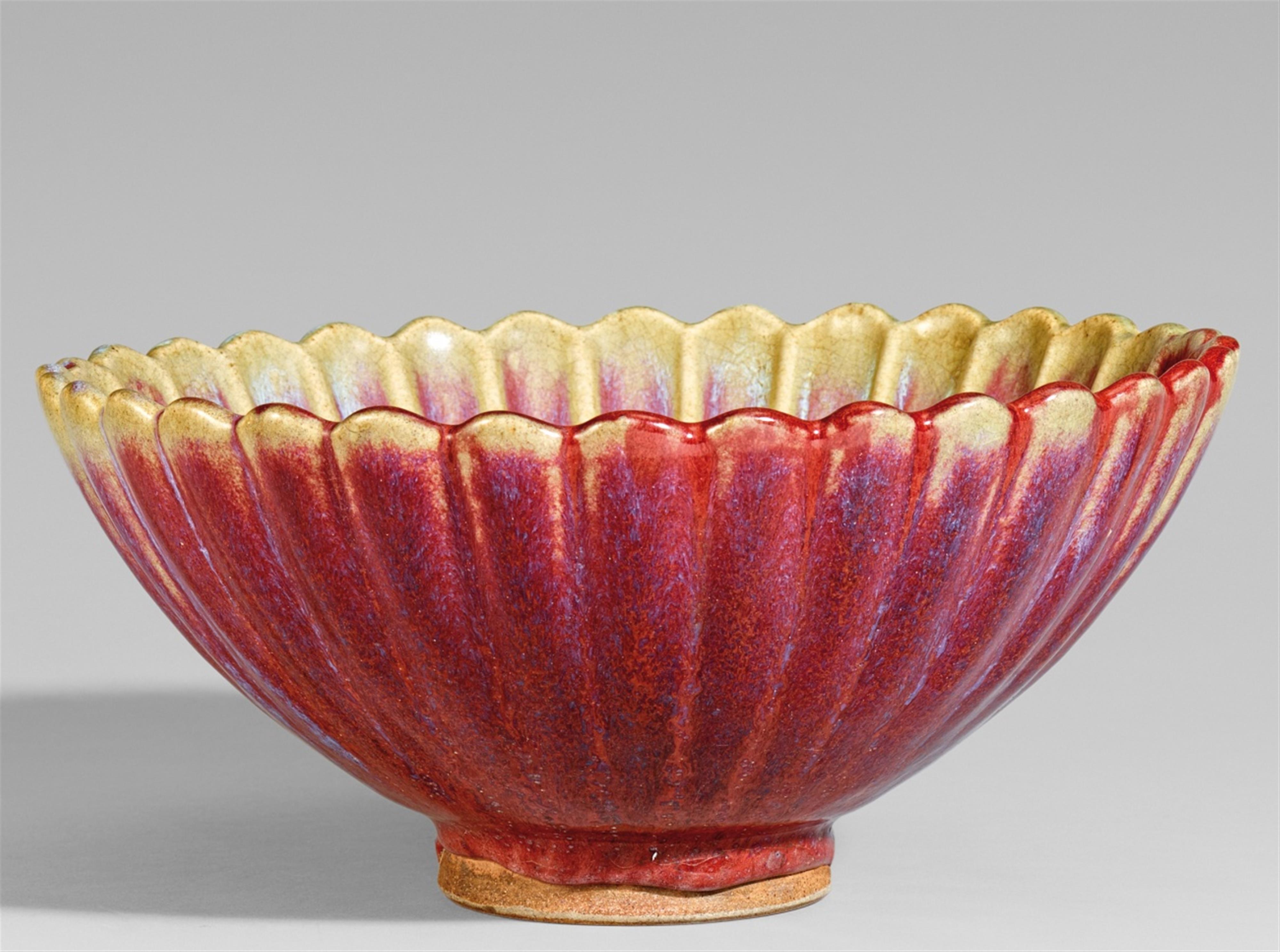 A large flambé-glazed chrysanthemum bowl. Shiwan, Guangdong. 19th/20th century - image-1