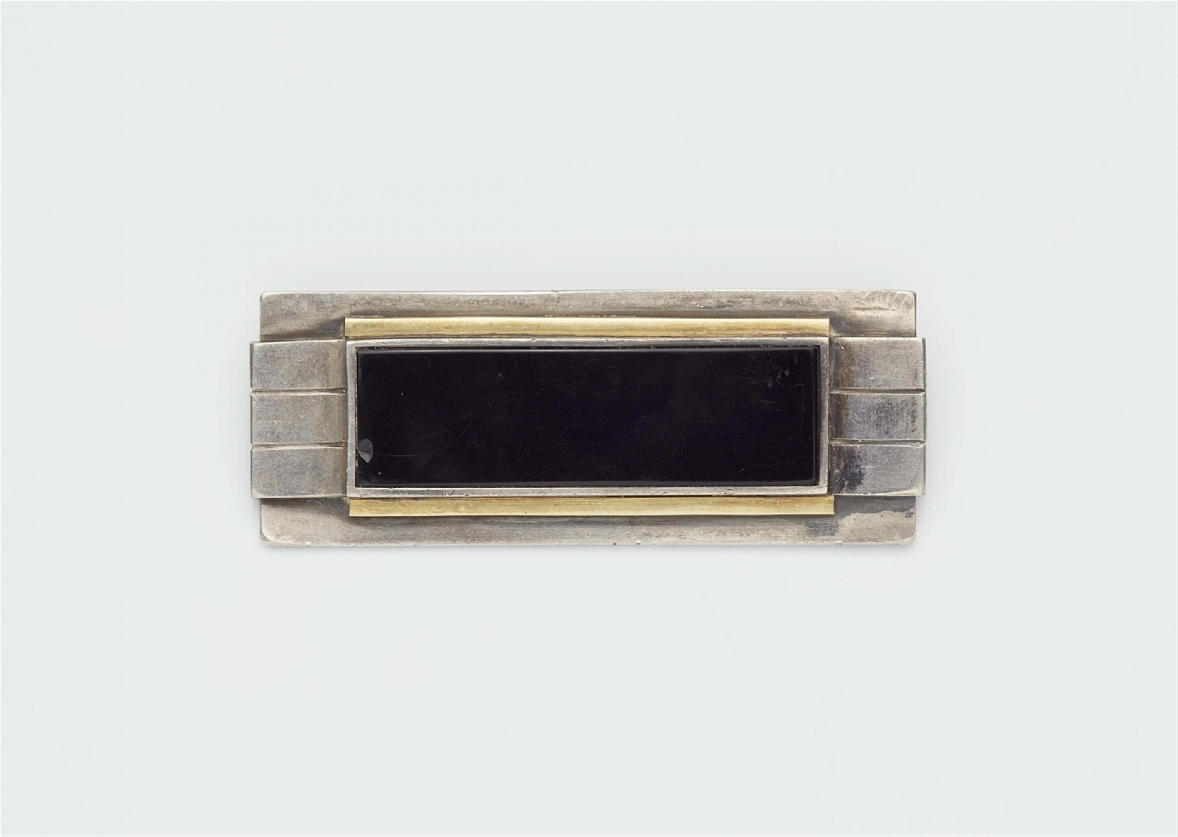 A Jean Després silver brooch - image-1