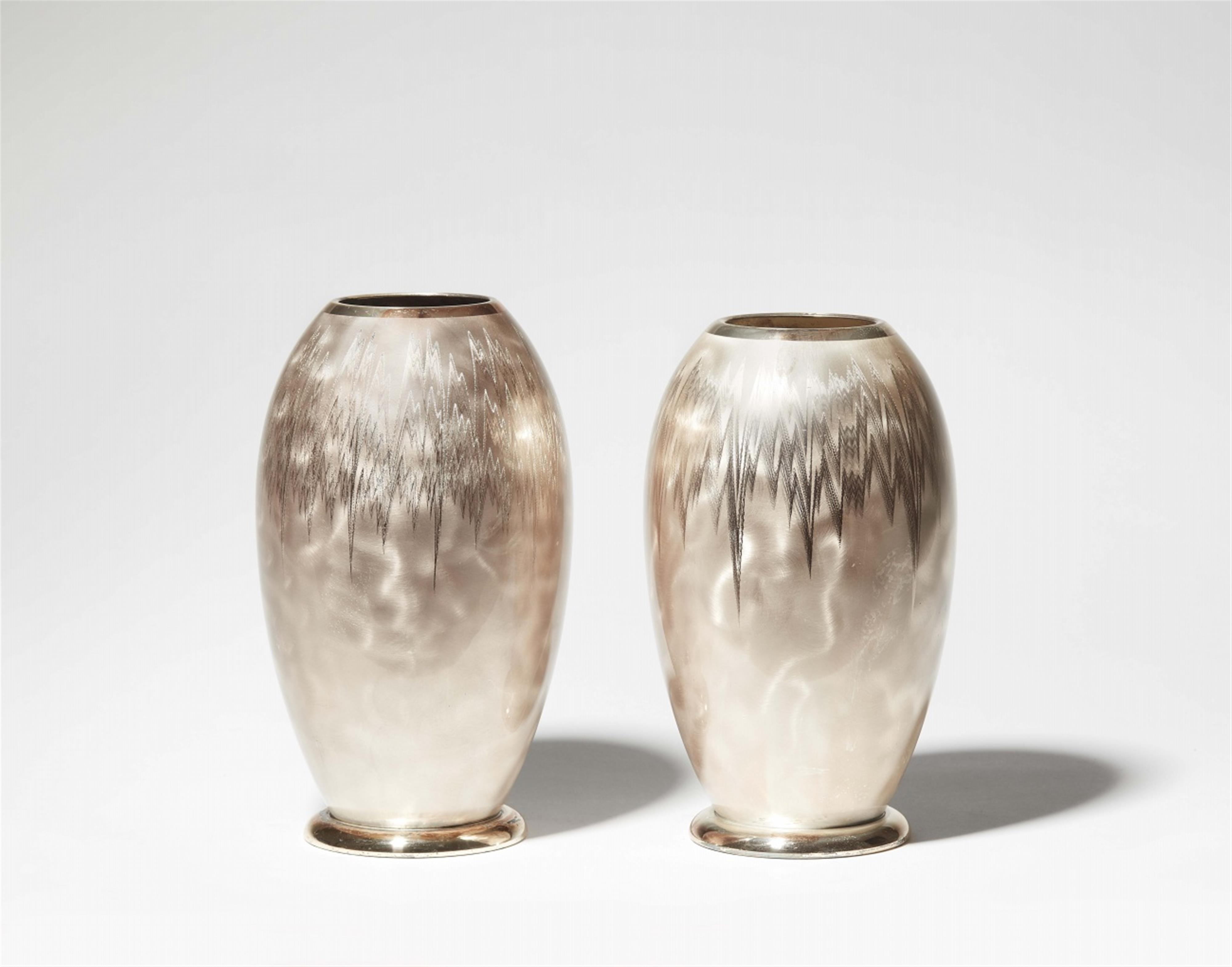 A pair of WMF galvanized silver-plated brass vases - image-1