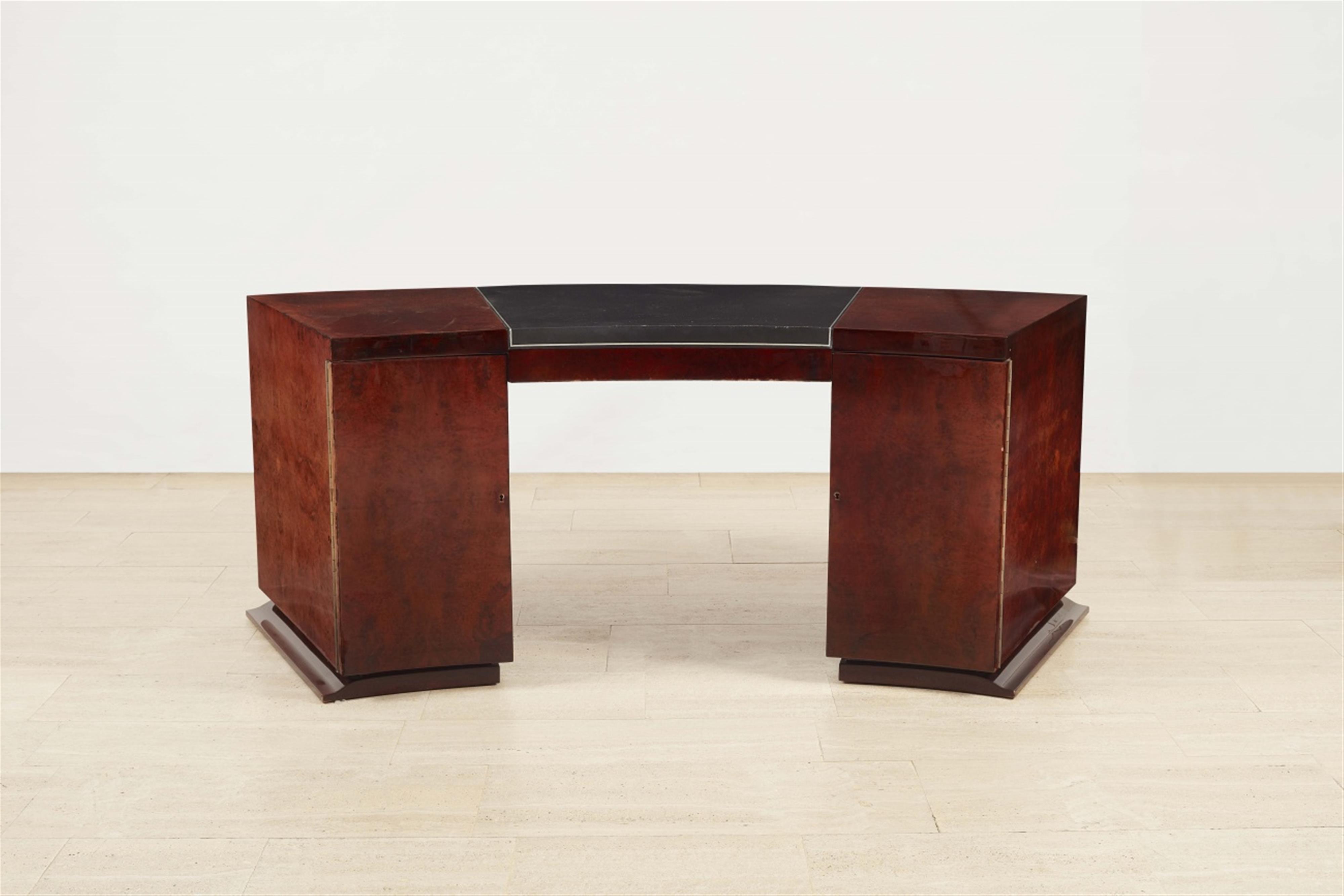 A curved office desk by a follower of Jacques Adnet - image-2