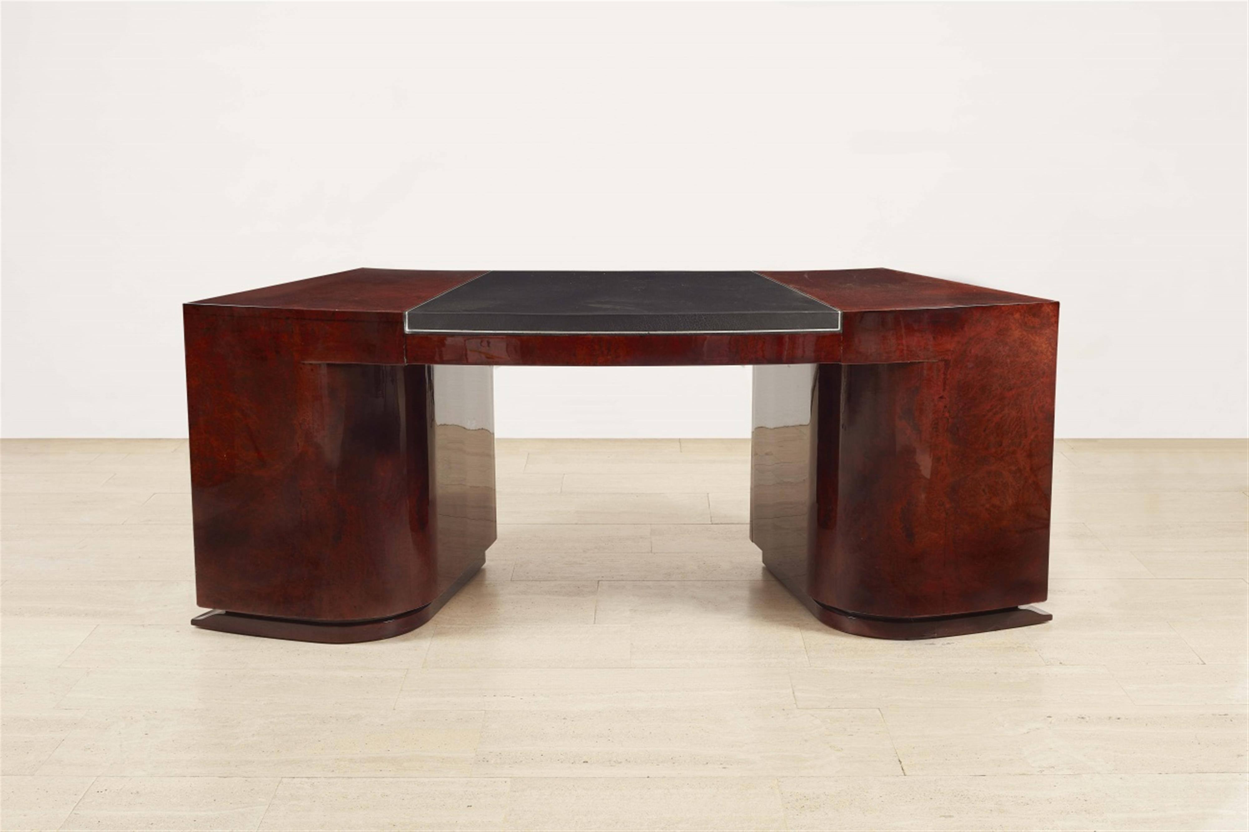 A curved office desk by a follower of Jacques Adnet - image-1