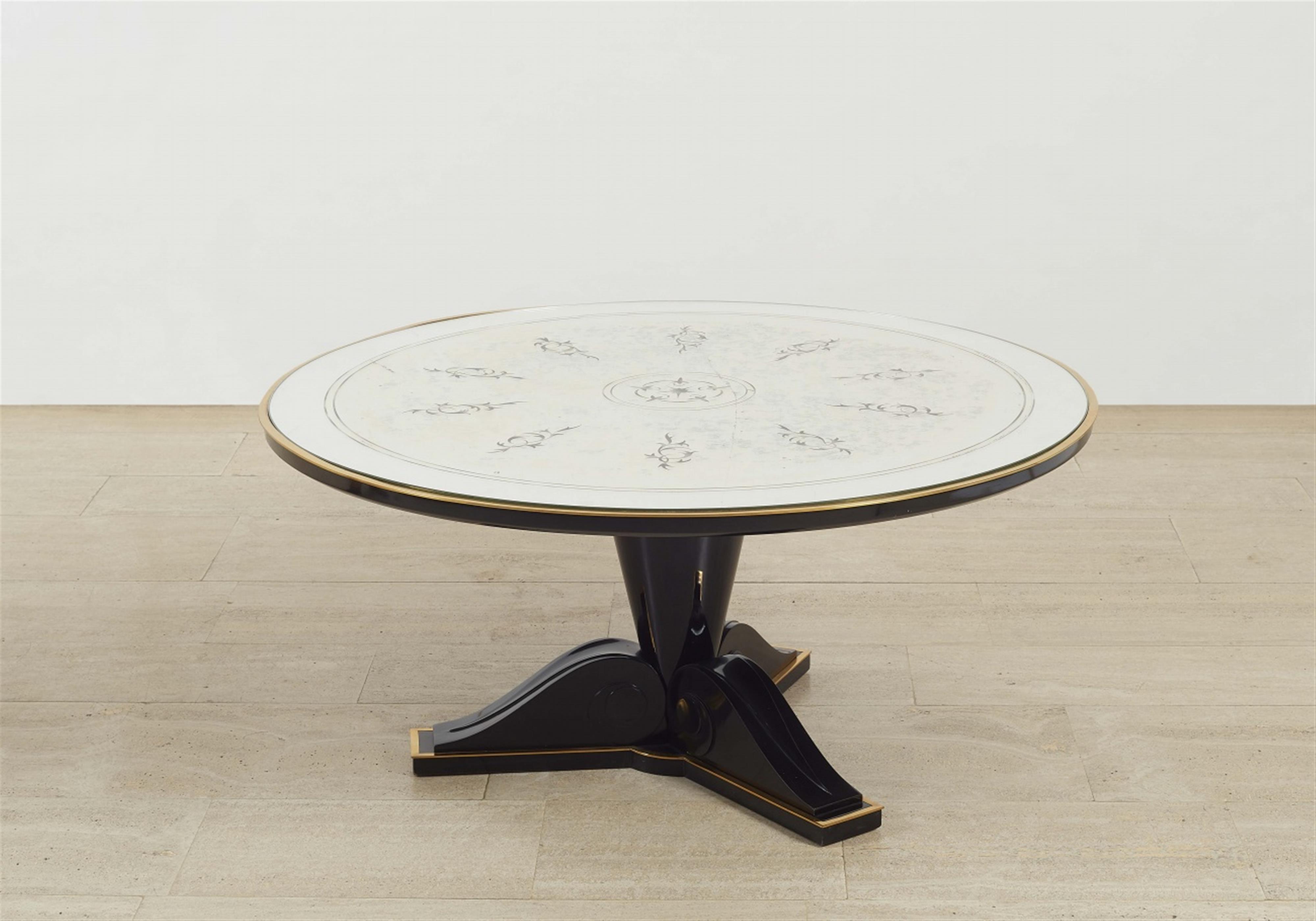 An ebonised wood coffee table attributed to René Drouet (DIM) - image-1