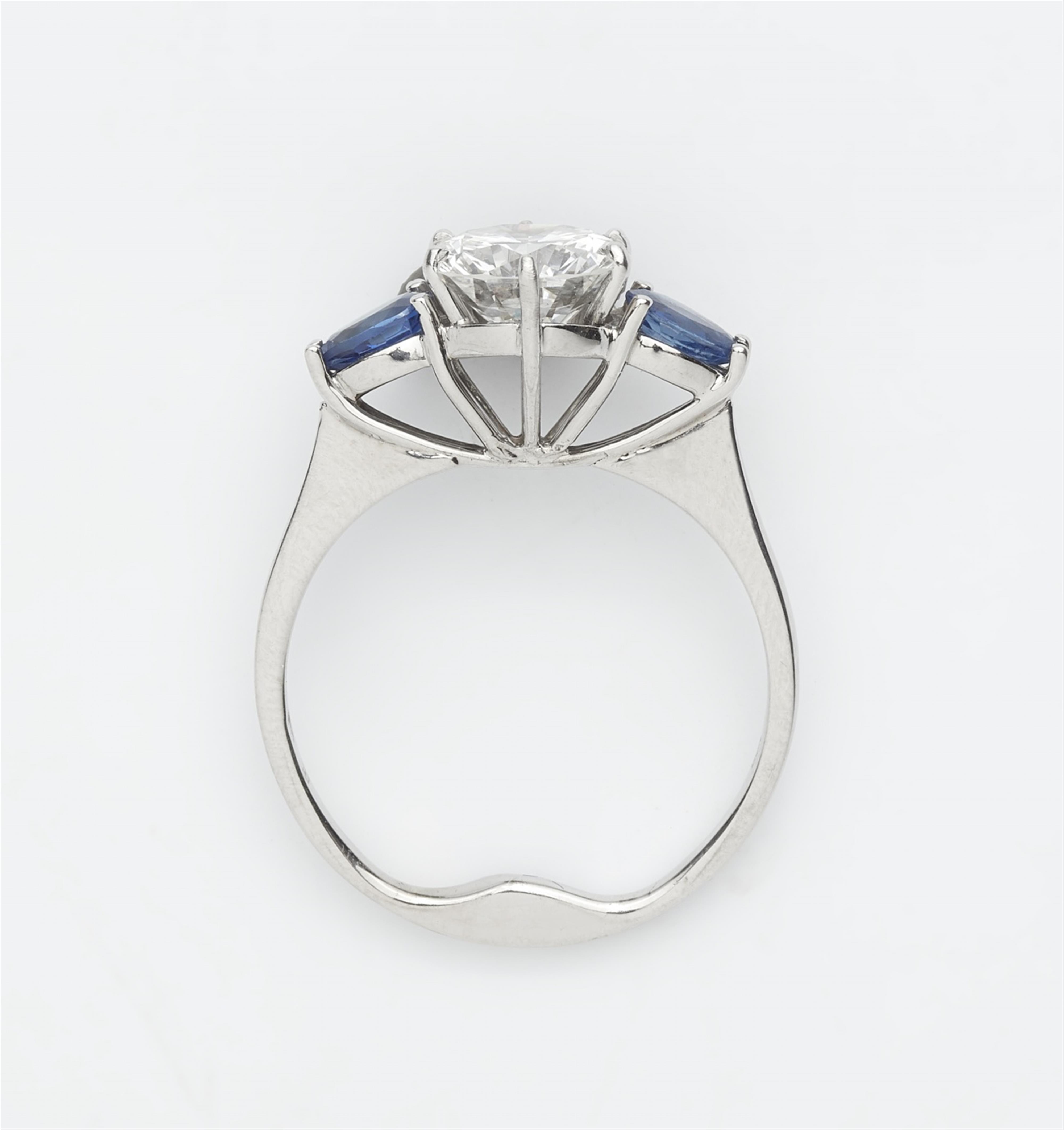 An 18k white gold, sapphire, and diamond ring - image-2