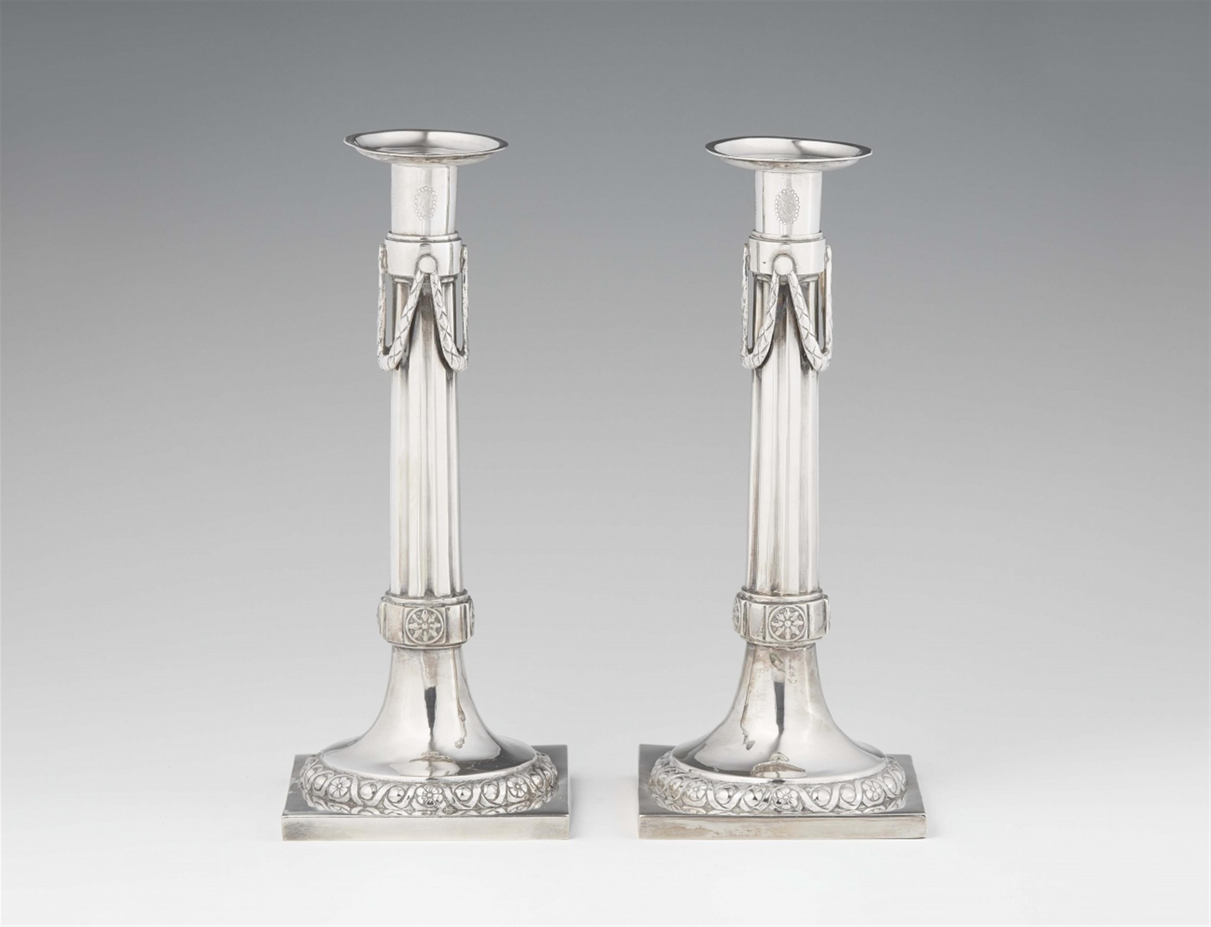 A pair of Augsburg silver candlesticks - image-1