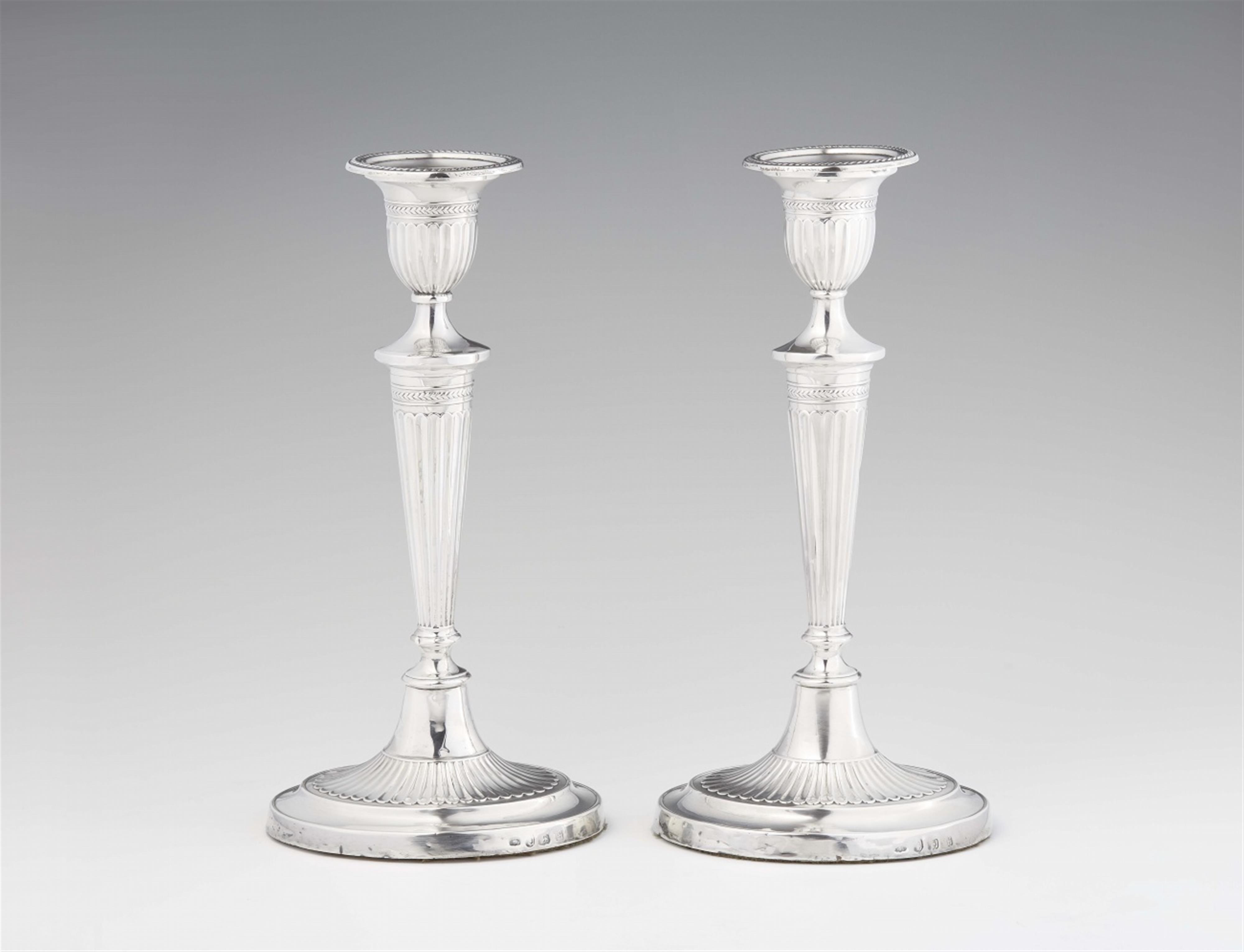 A pair of George III silver candlesticks - image-2