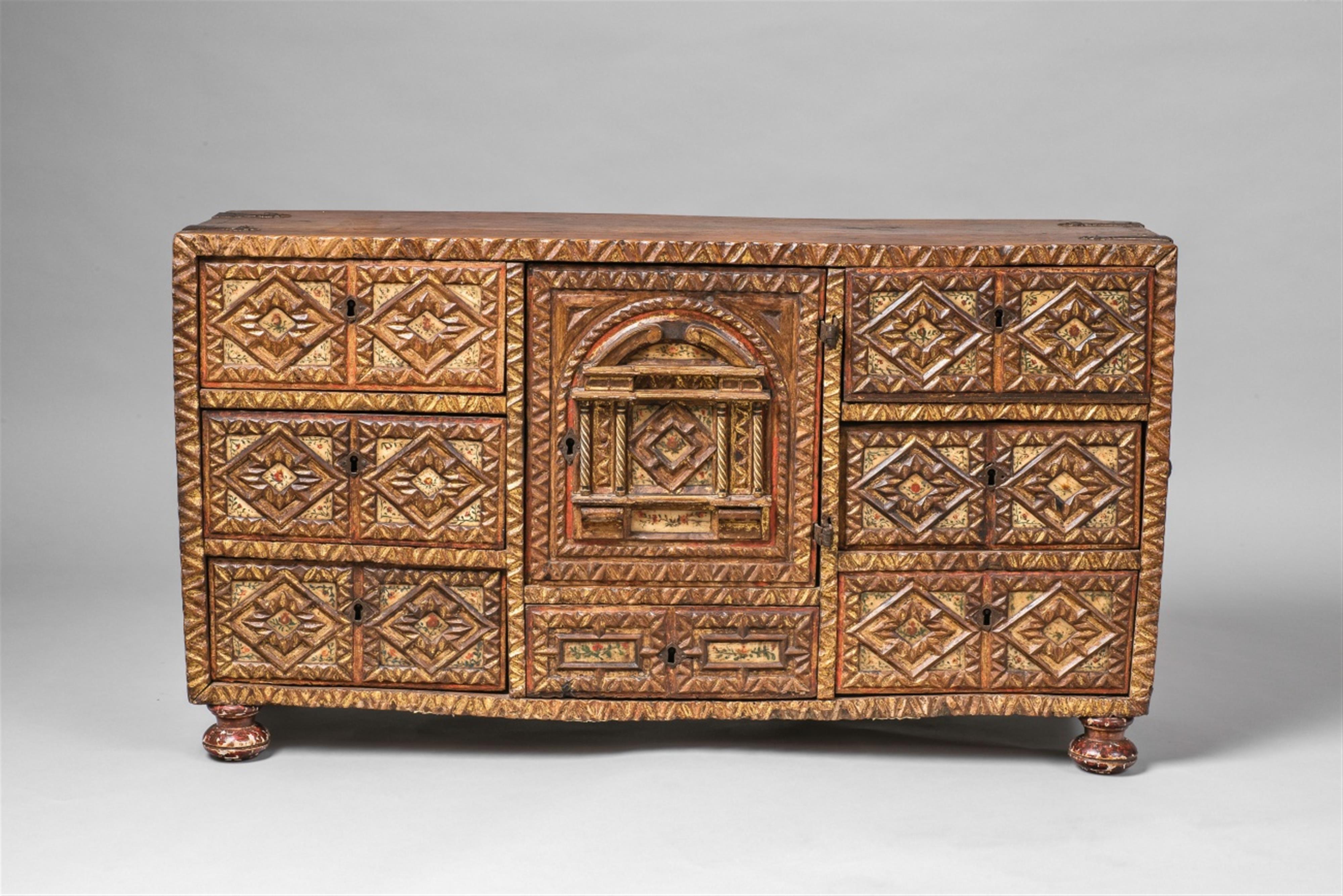 A Spanish carved walnut sideboard - image-1