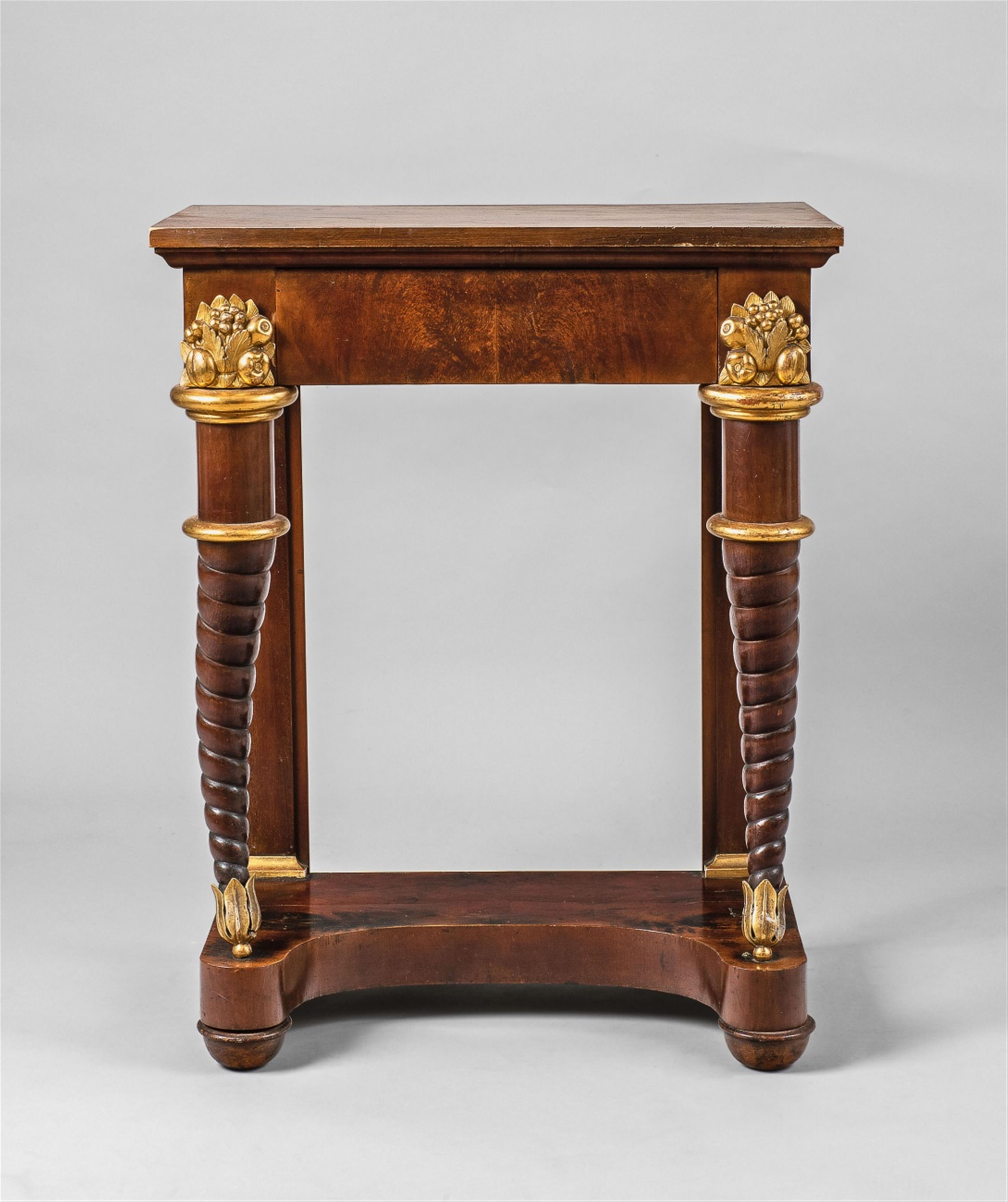 A carved walnut console table with cornucopia supports - image-1