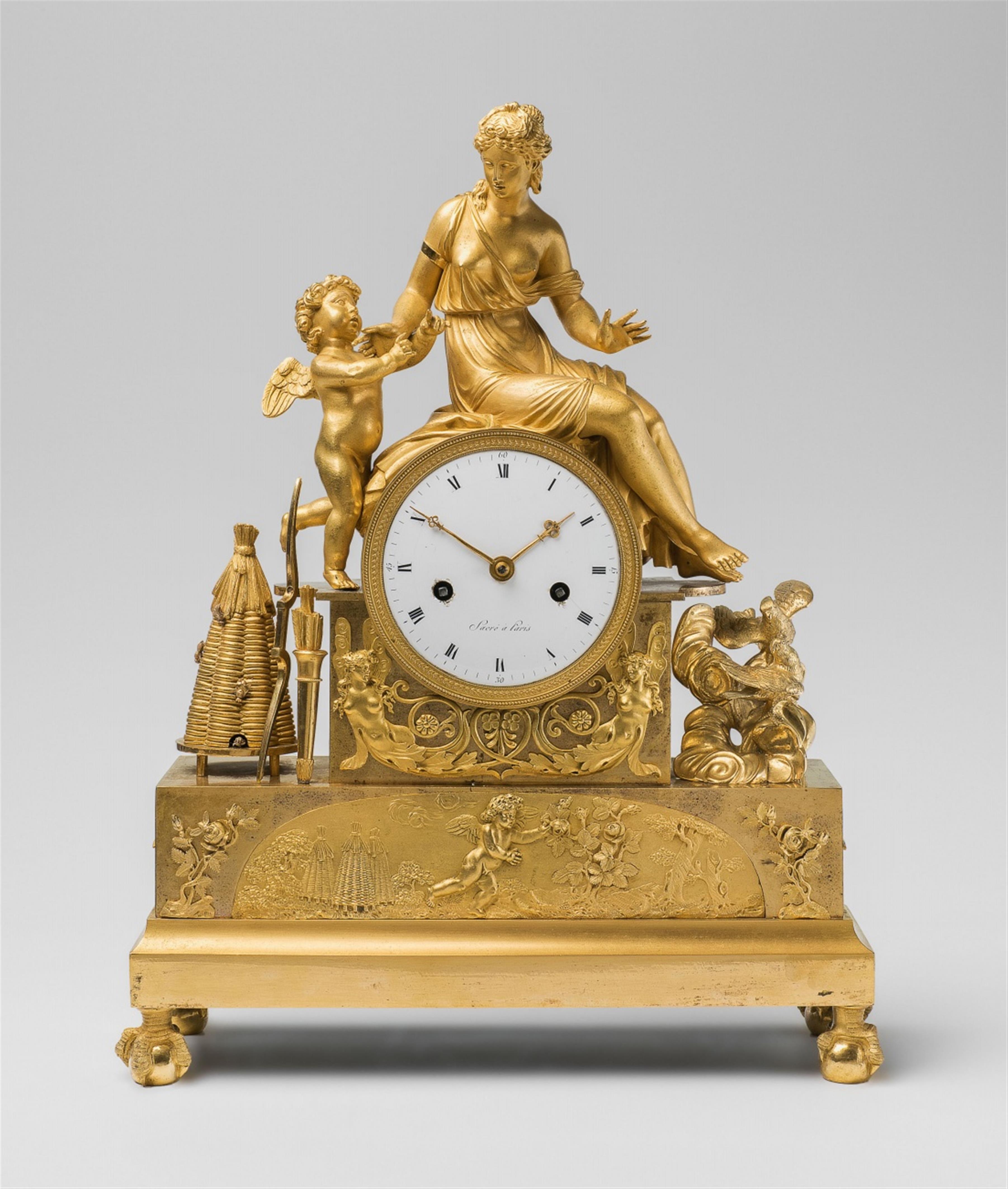 A Parisian ormolu pendulum clock with Cupid stealing honey - image-1