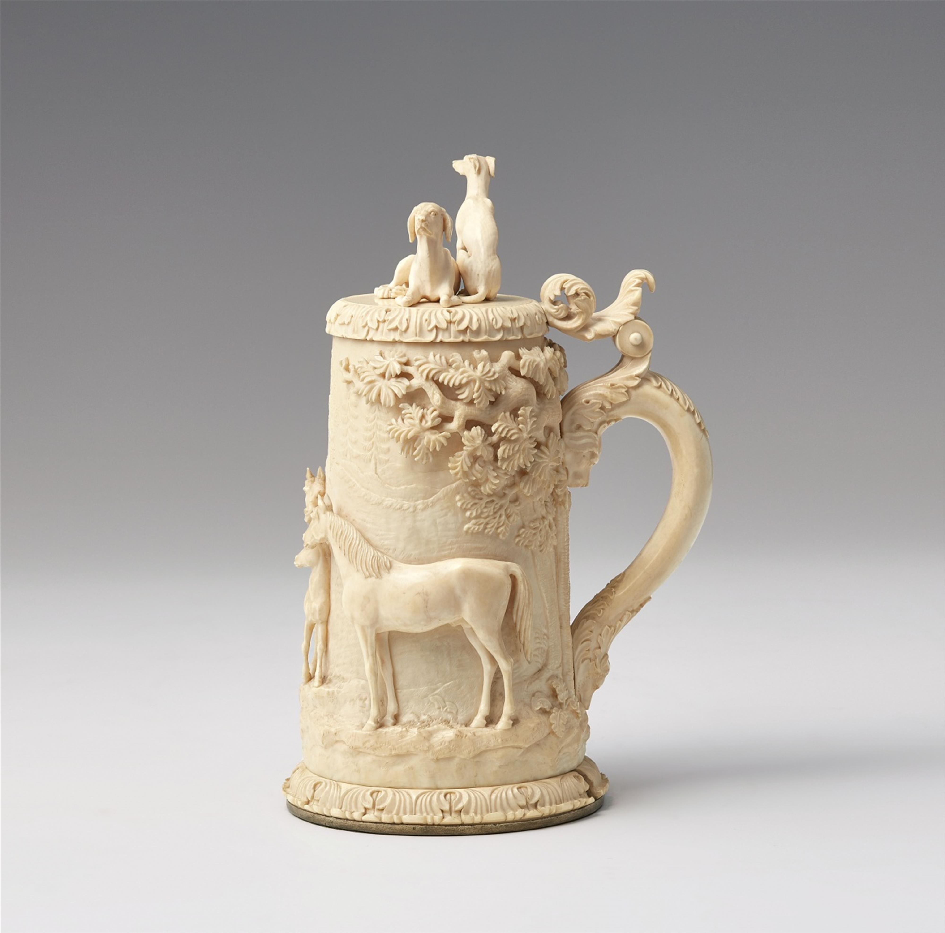 A small ivory tankard with horses and dogs - image-2