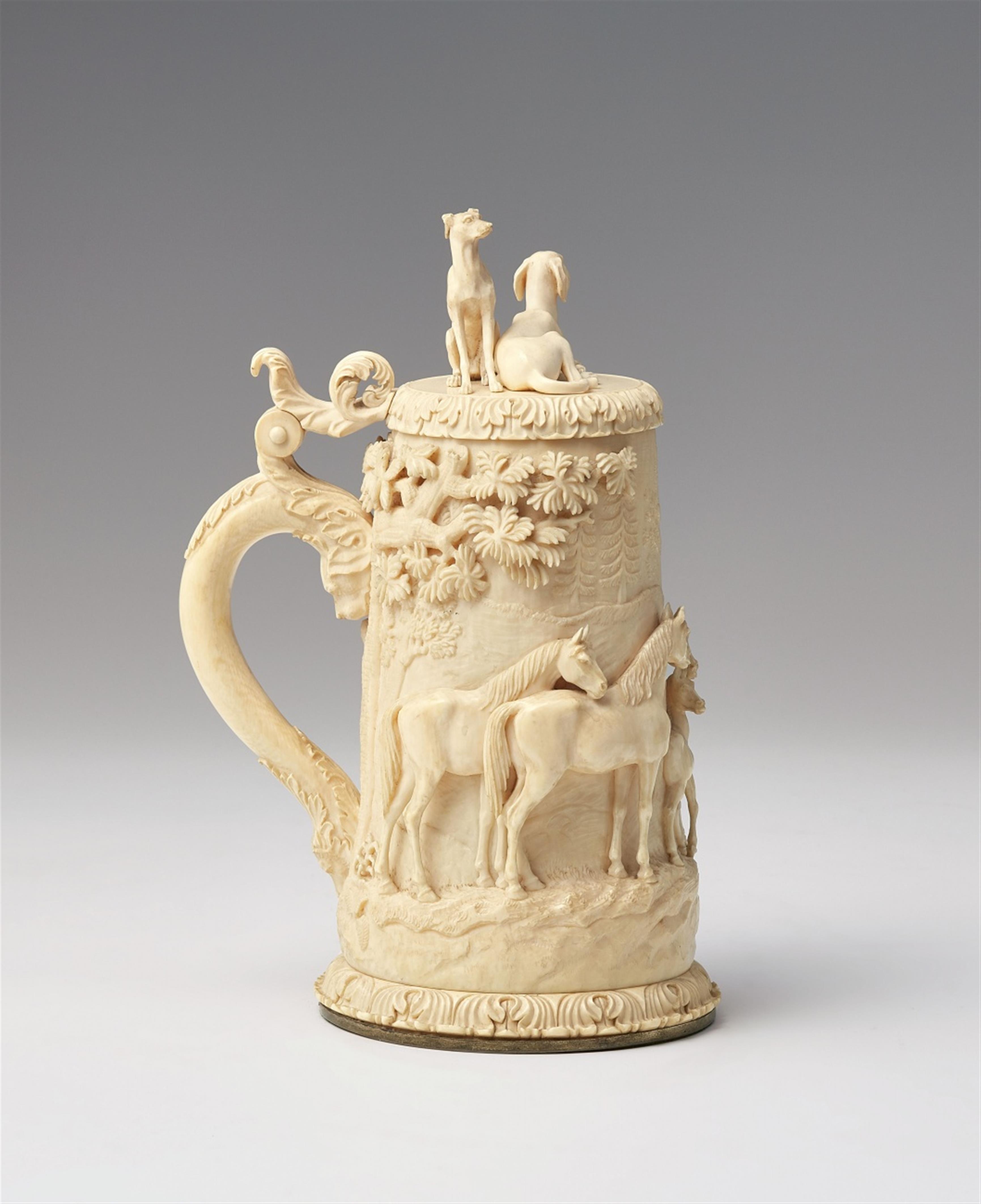 A small ivory tankard with horses and dogs - image-3