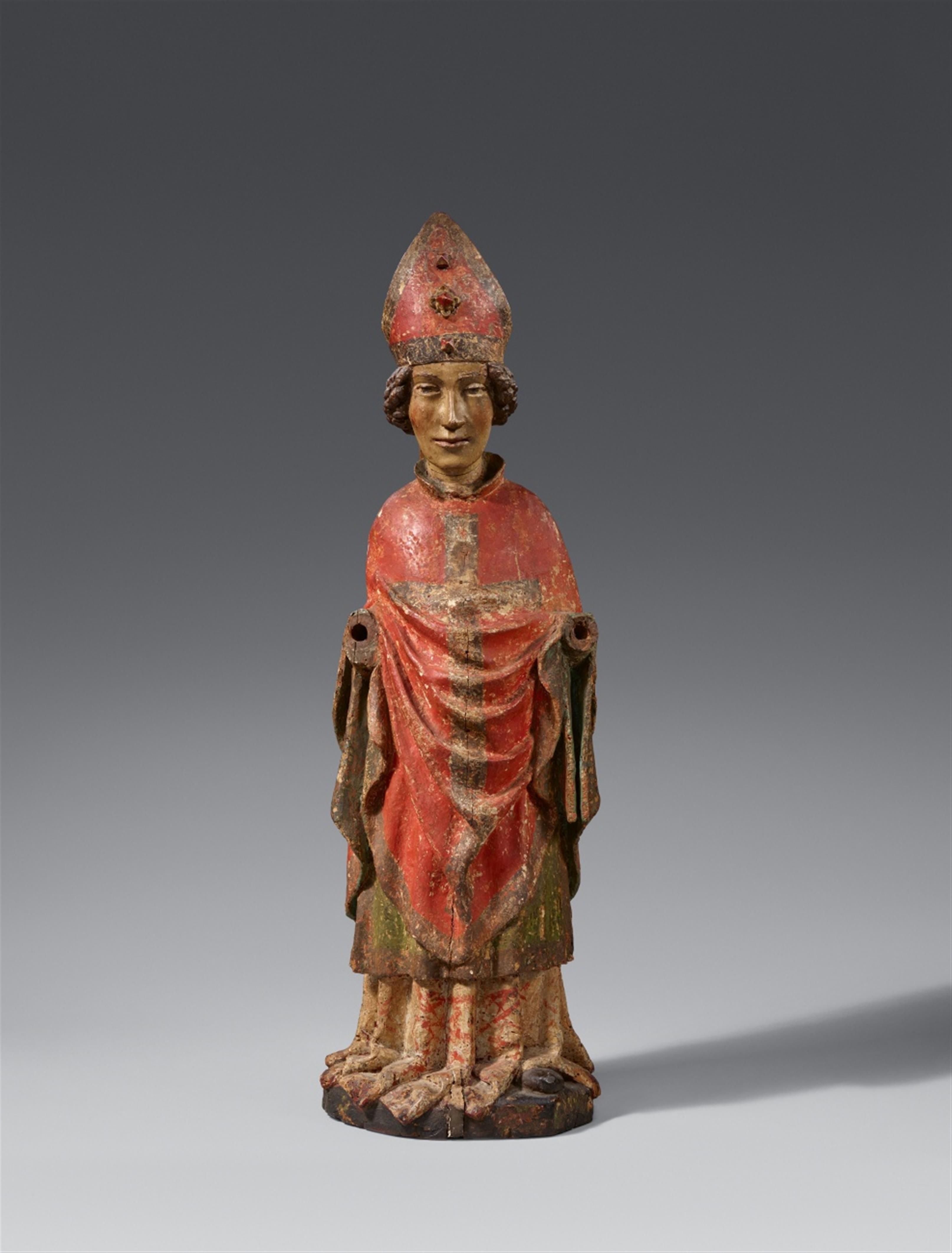 Tyrol circa 1400 - A Tyrolese carved wood figure of a bishop saint, circa 1400 - image-1