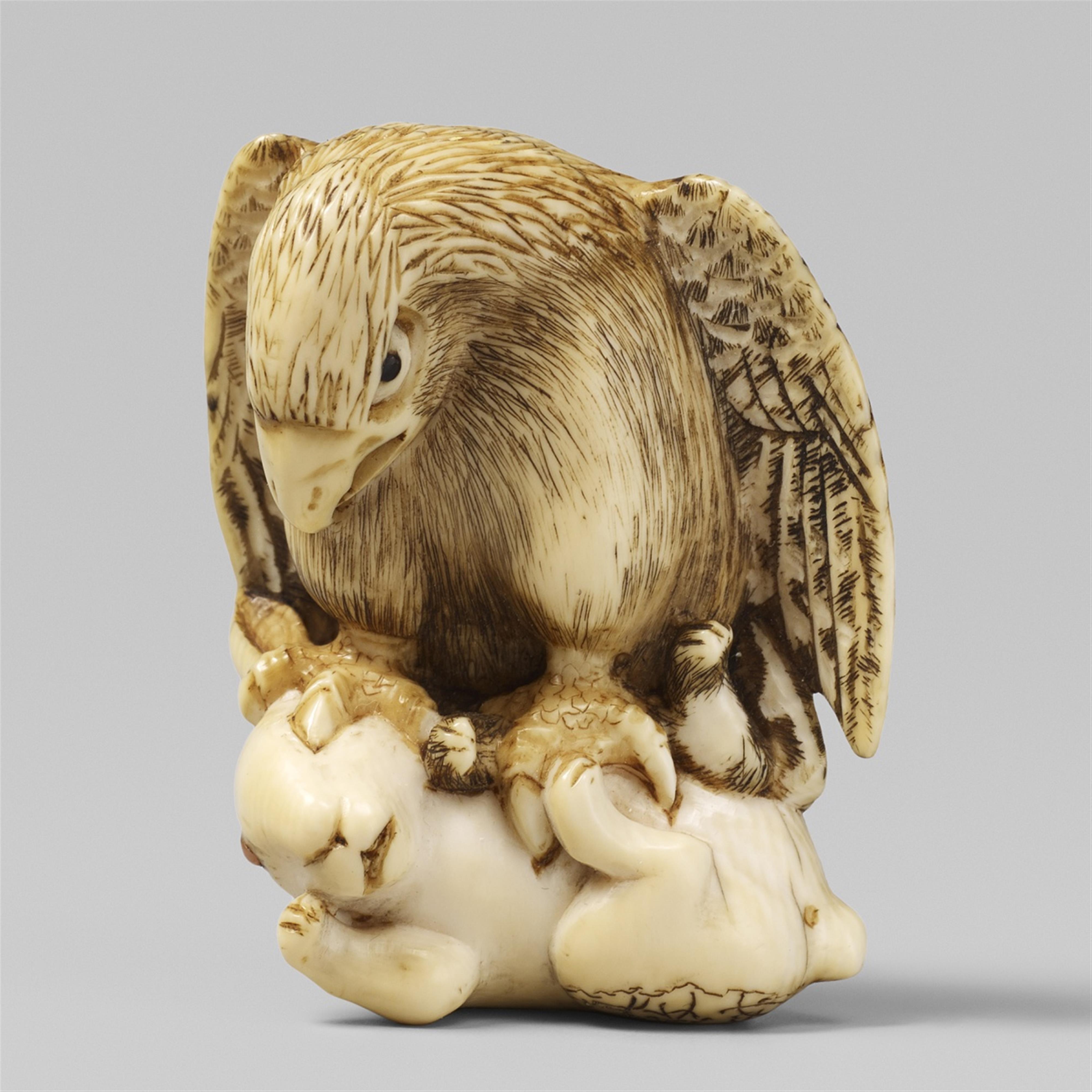An ivory netsuke of an eagle and a hare. Mid-19th century - image-1