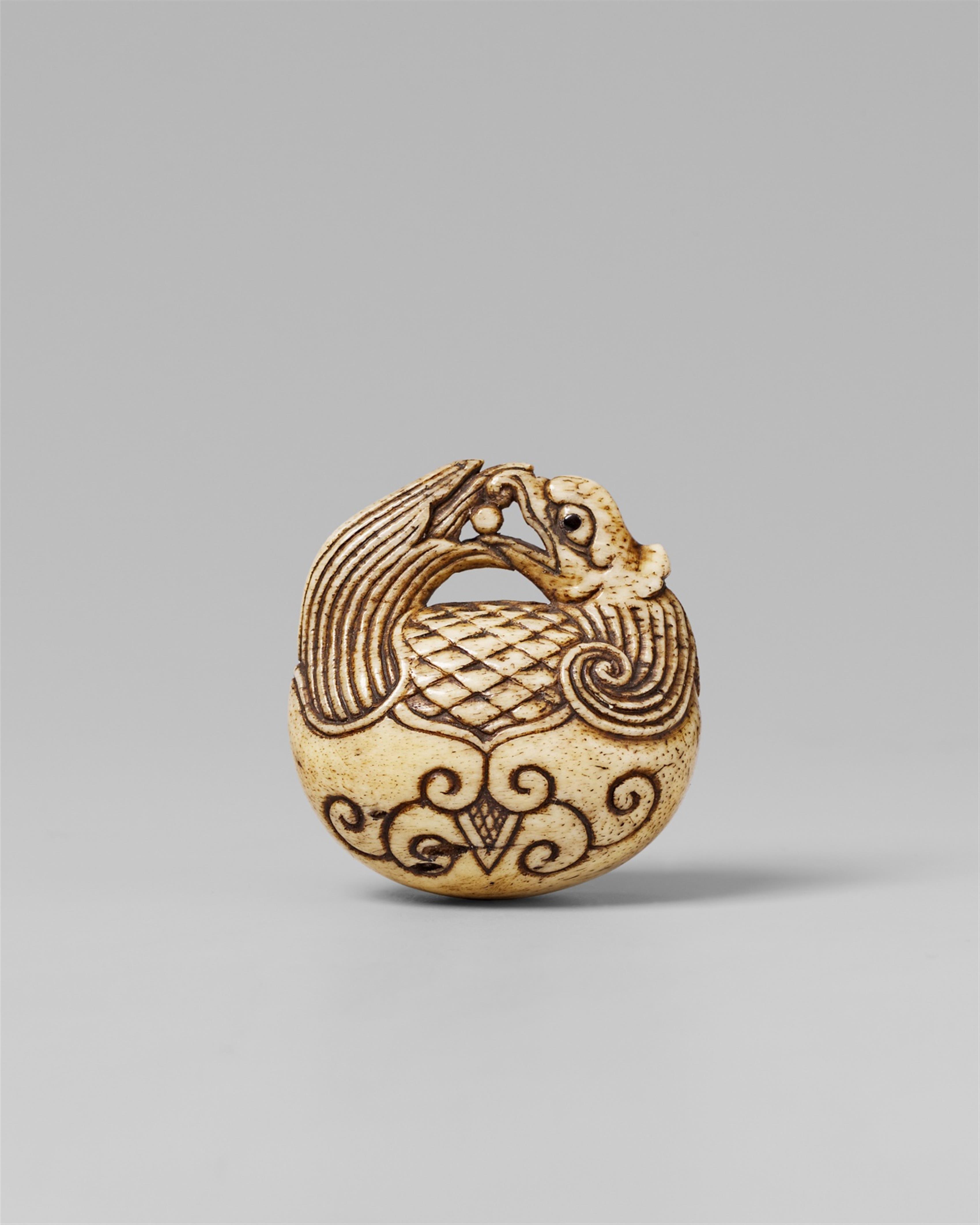 A bone netsuke of a mokugyo. Late 19th century - image-1