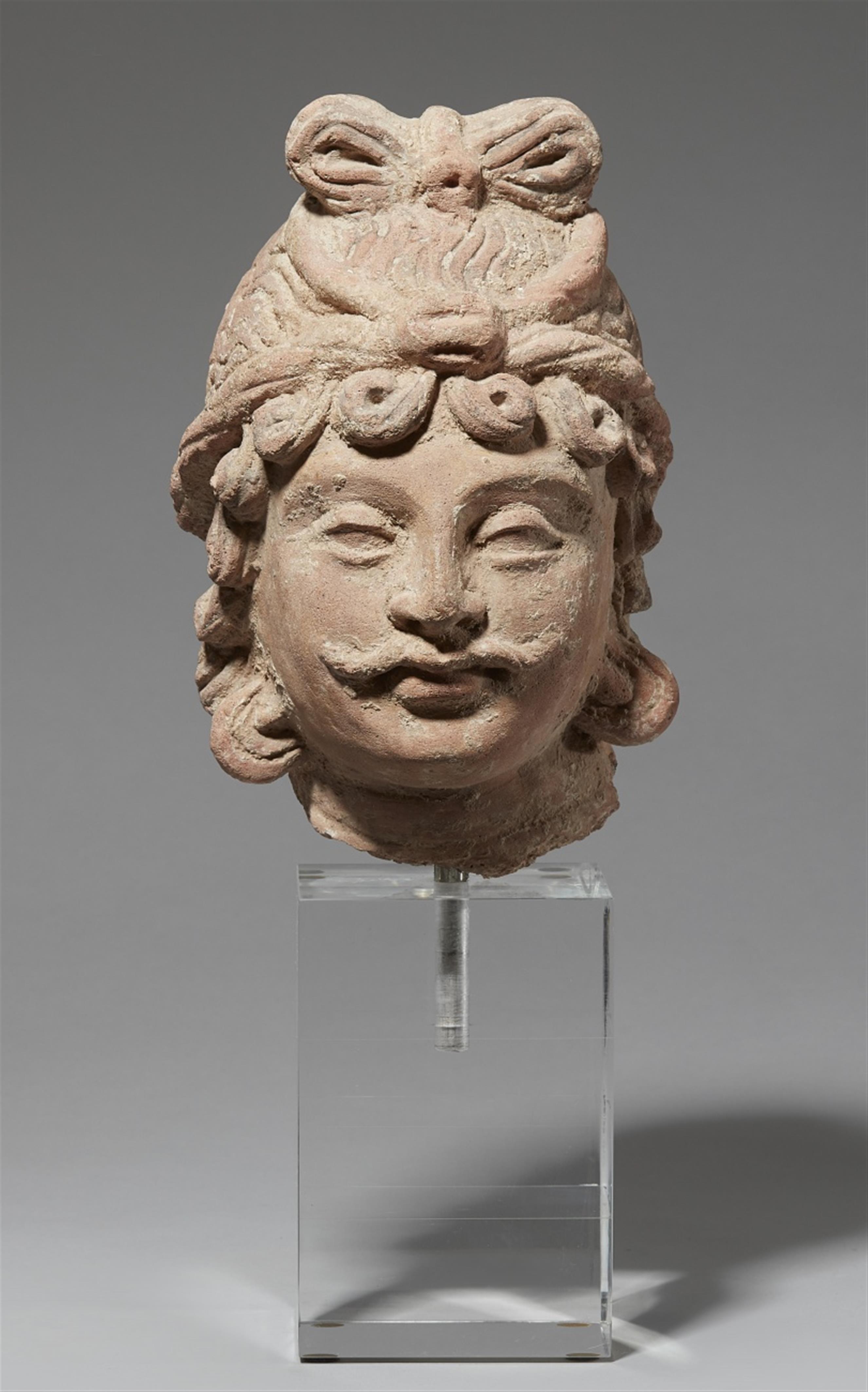 A Gandhara unfired clay head of a bodhisattva. Pakistan. 4th/5th century - image-1