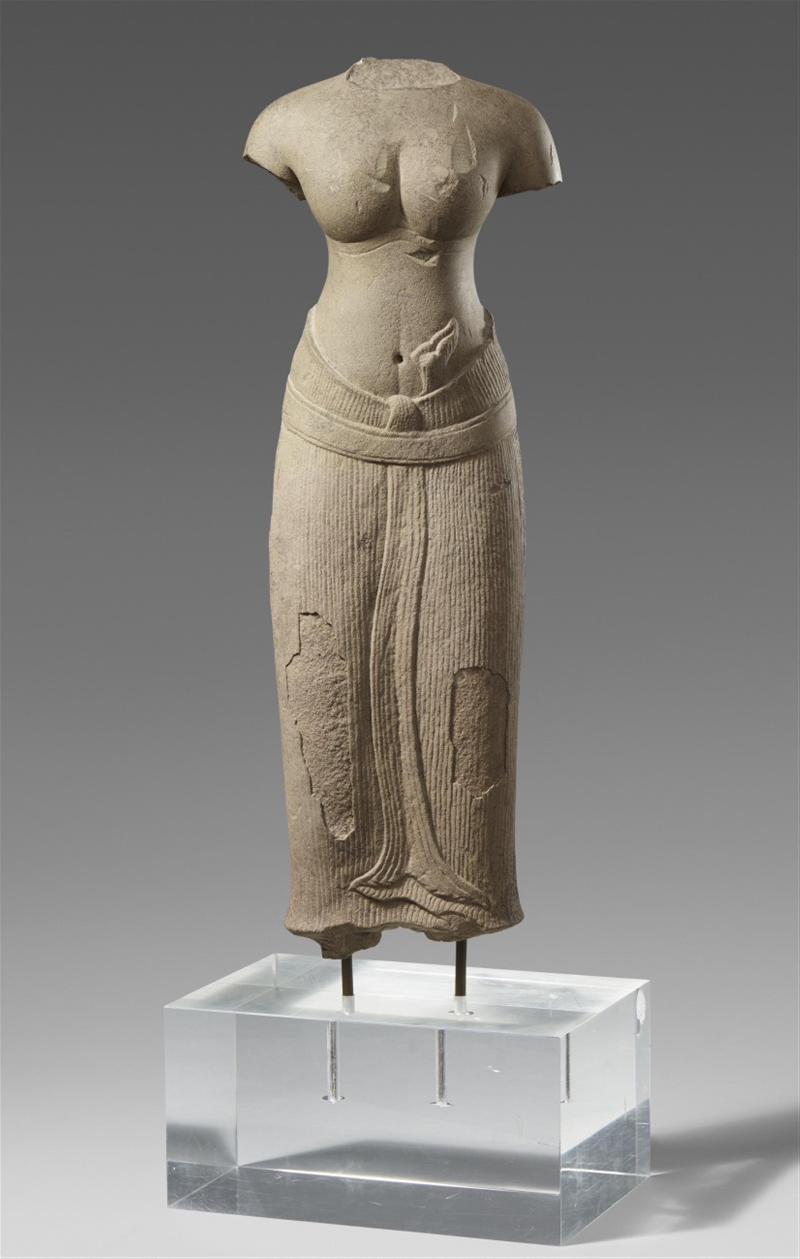 A Baphuon style grey sandstone torso of a female deity. Cambodia. Angkor. 11th century - image-1