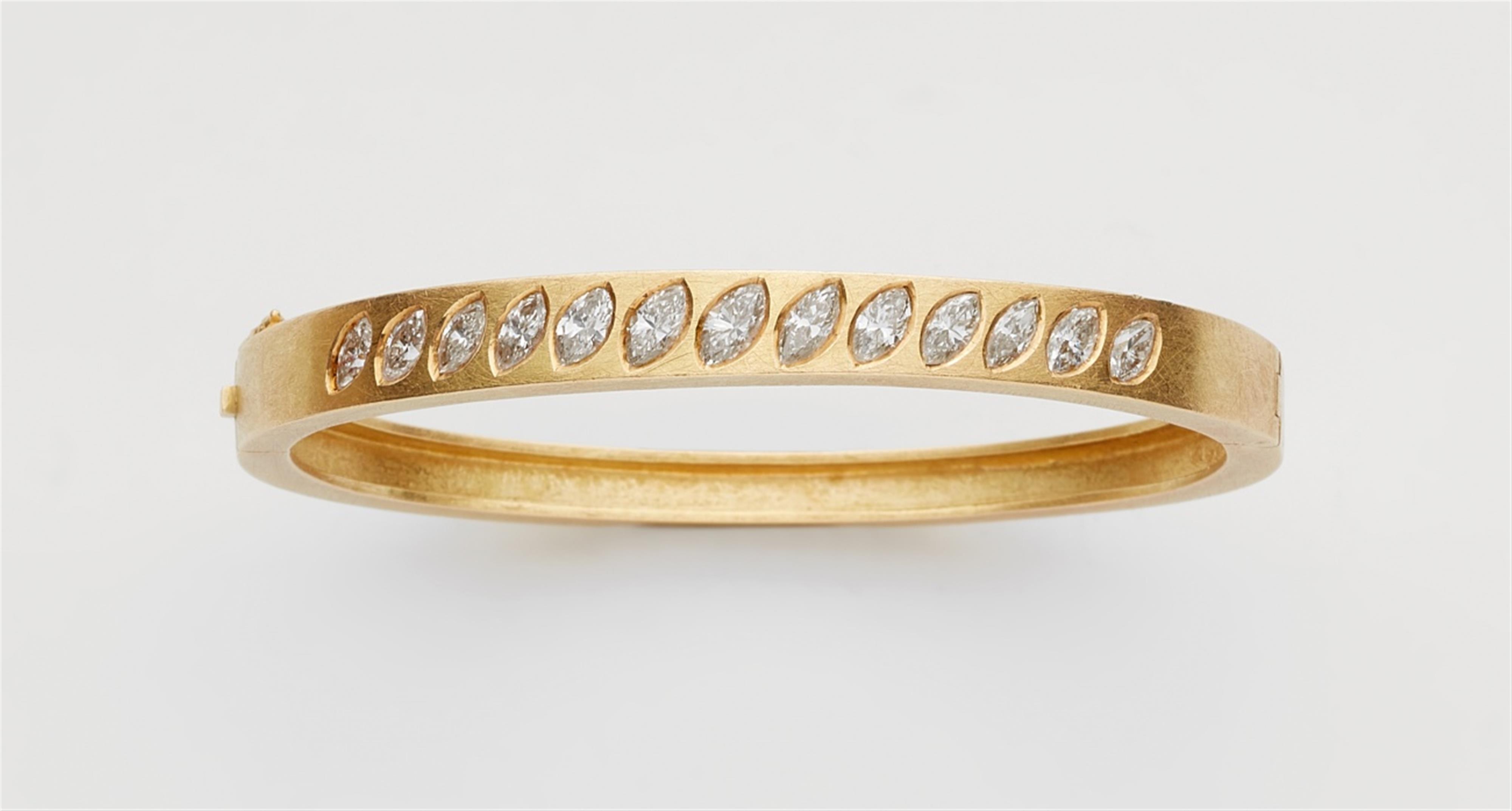 An 18k gold diamond bangle - image-1