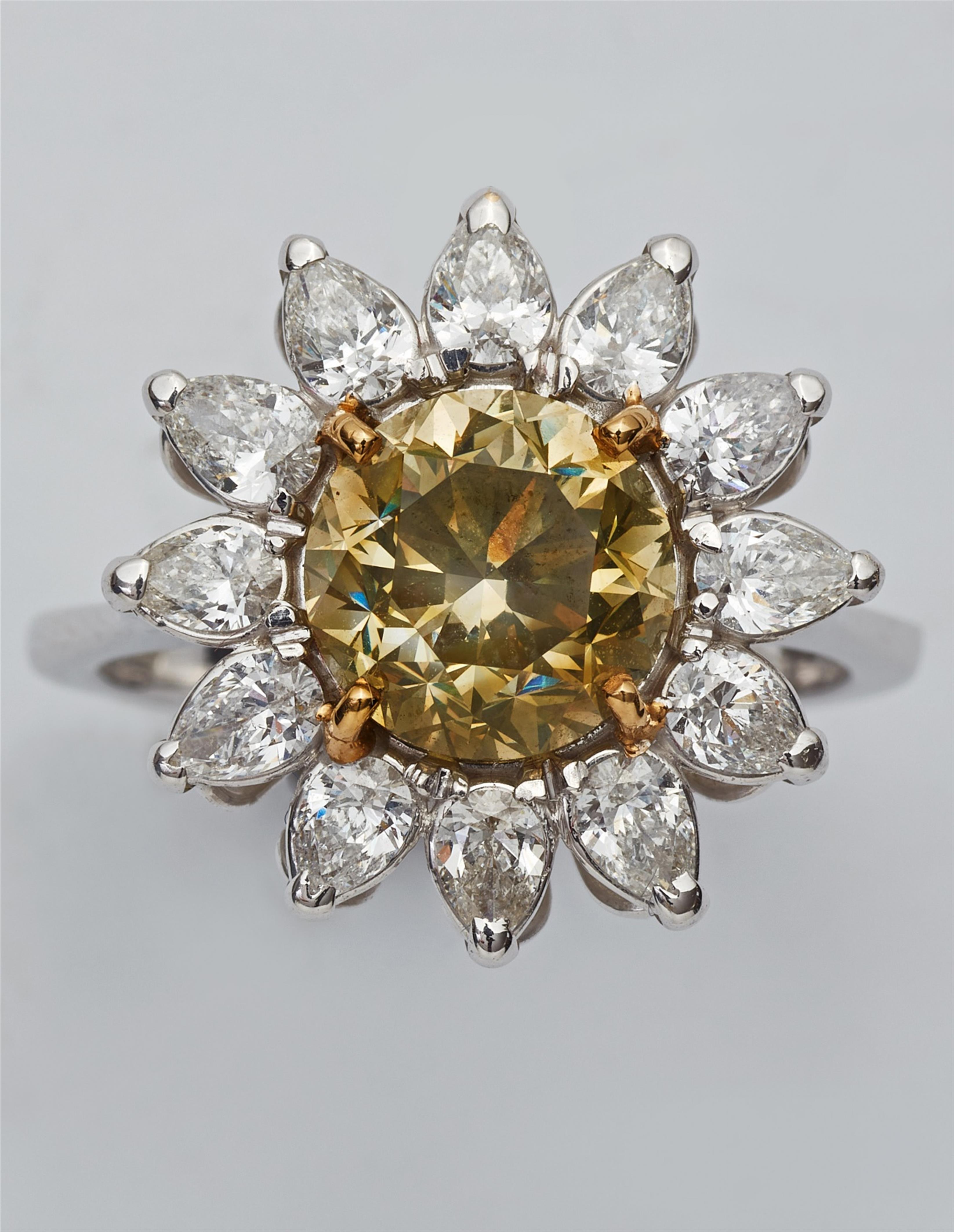 An 18k gold and fancy diamond ring - image-4
