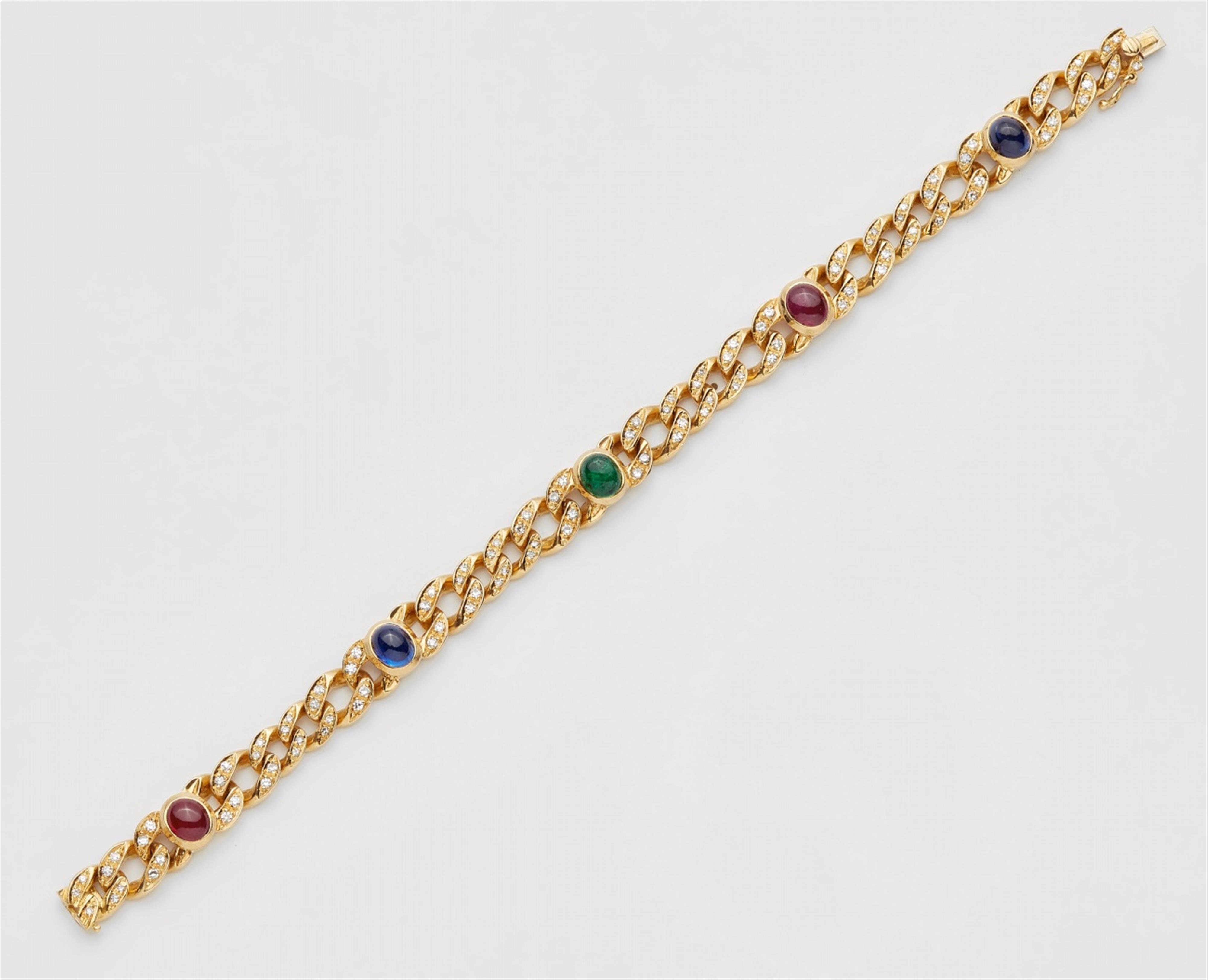 An 18k gold and coloured gemstone bracelet - image-2
