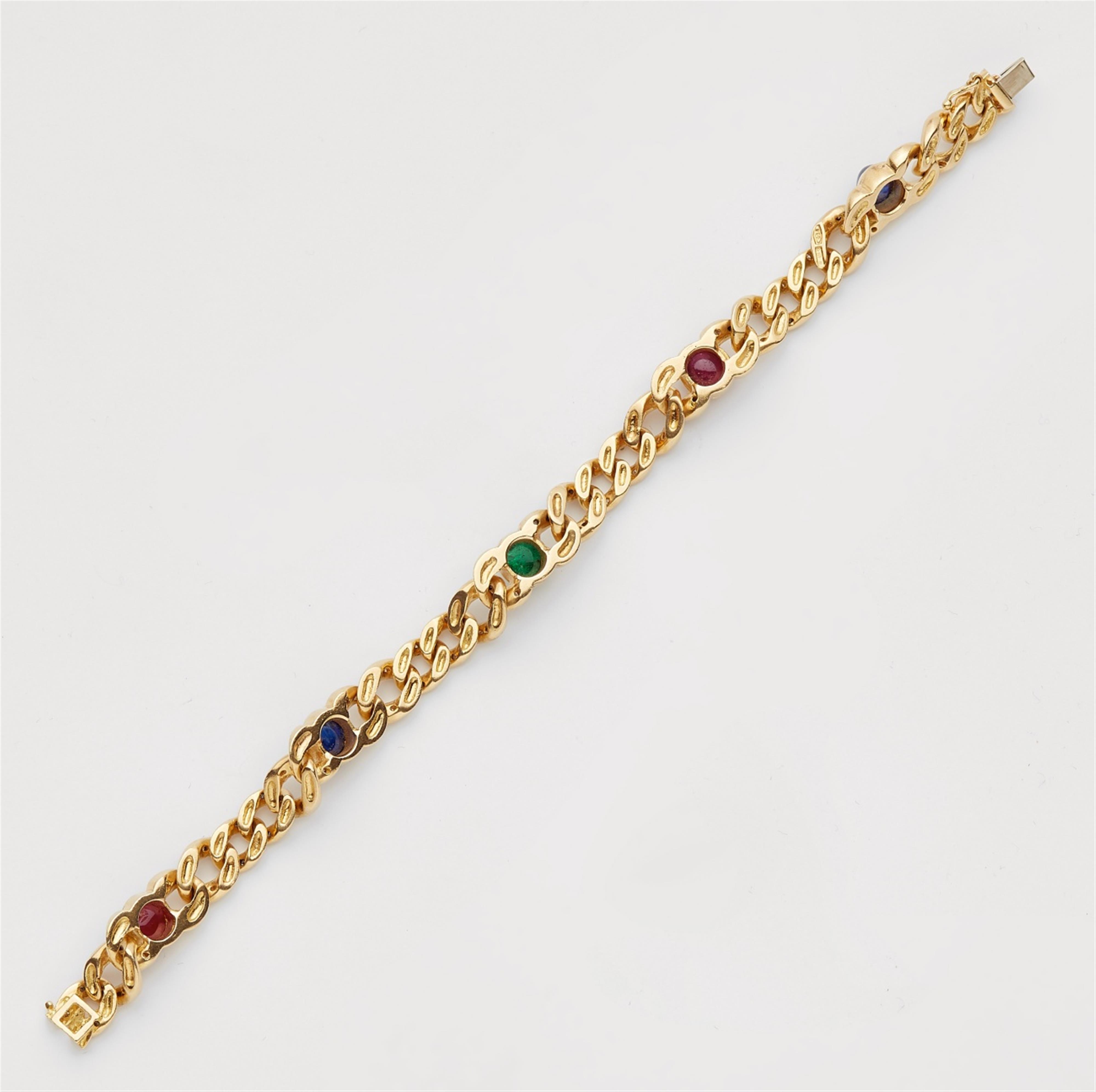 An 18k gold and coloured gemstone bracelet - image-3