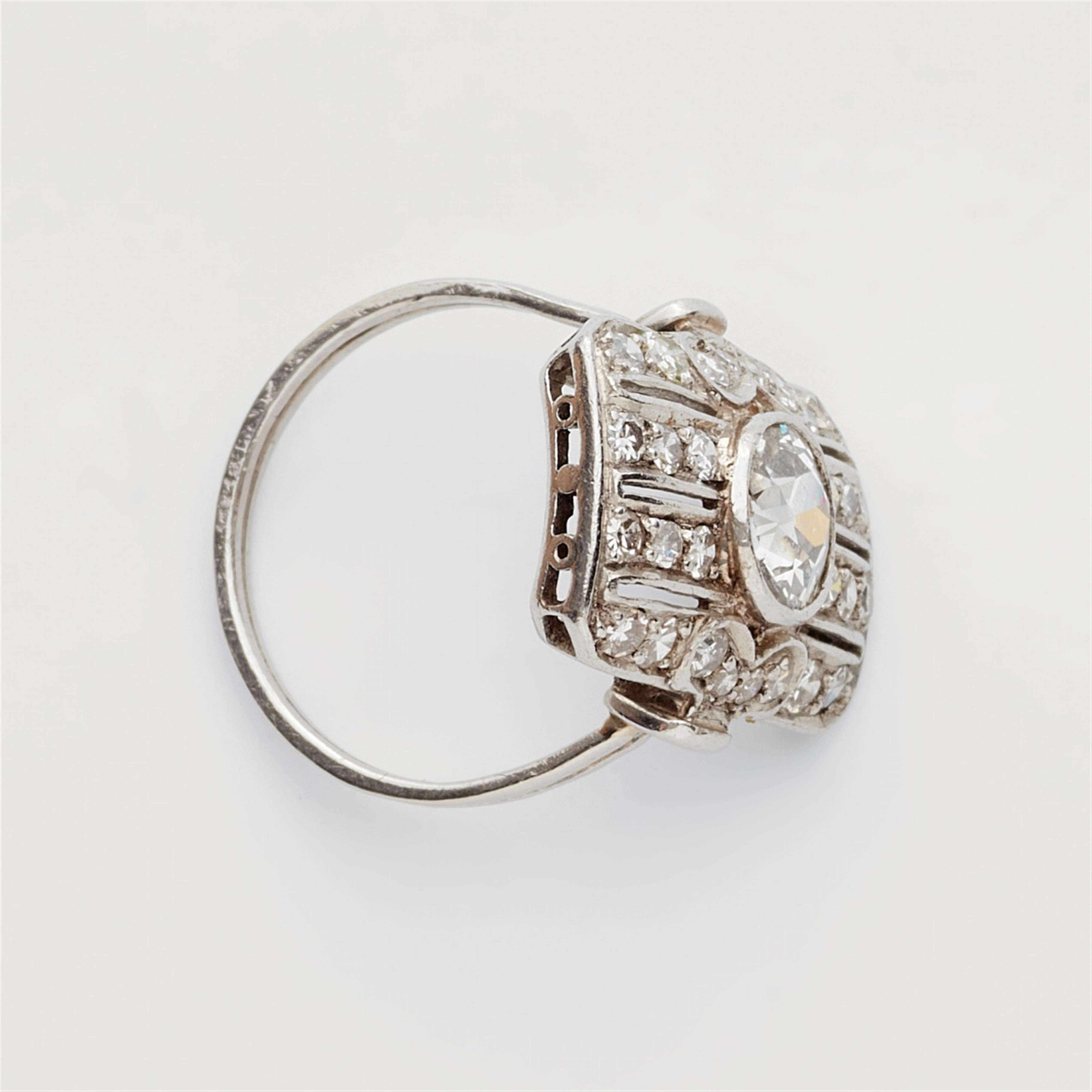 An 18k white gold Art Deco diamond solitaire ring - image-2