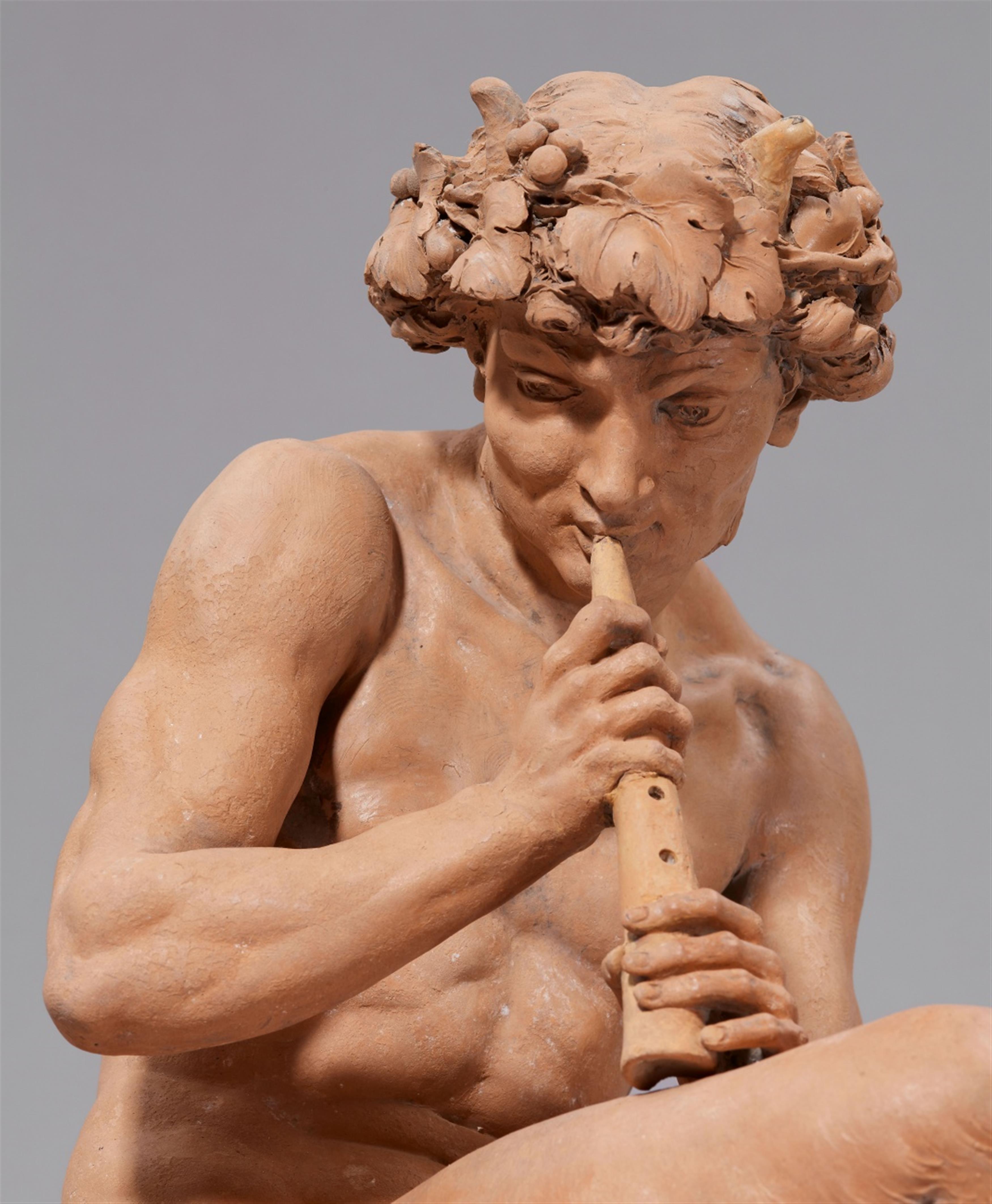 A terracotta group with a faun playing the flute - image-3