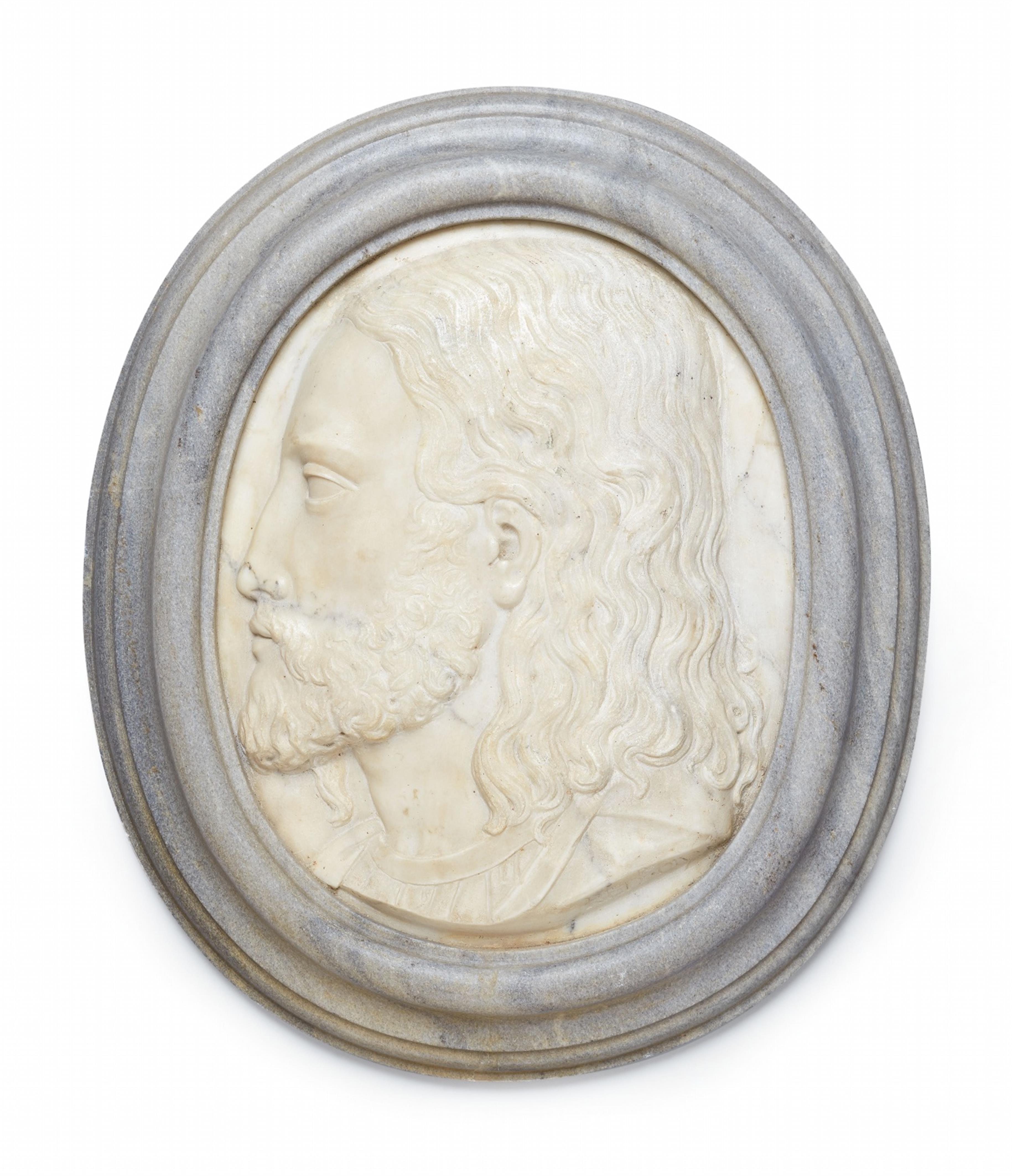 A marble relief plaque with the head of a young man - image-1