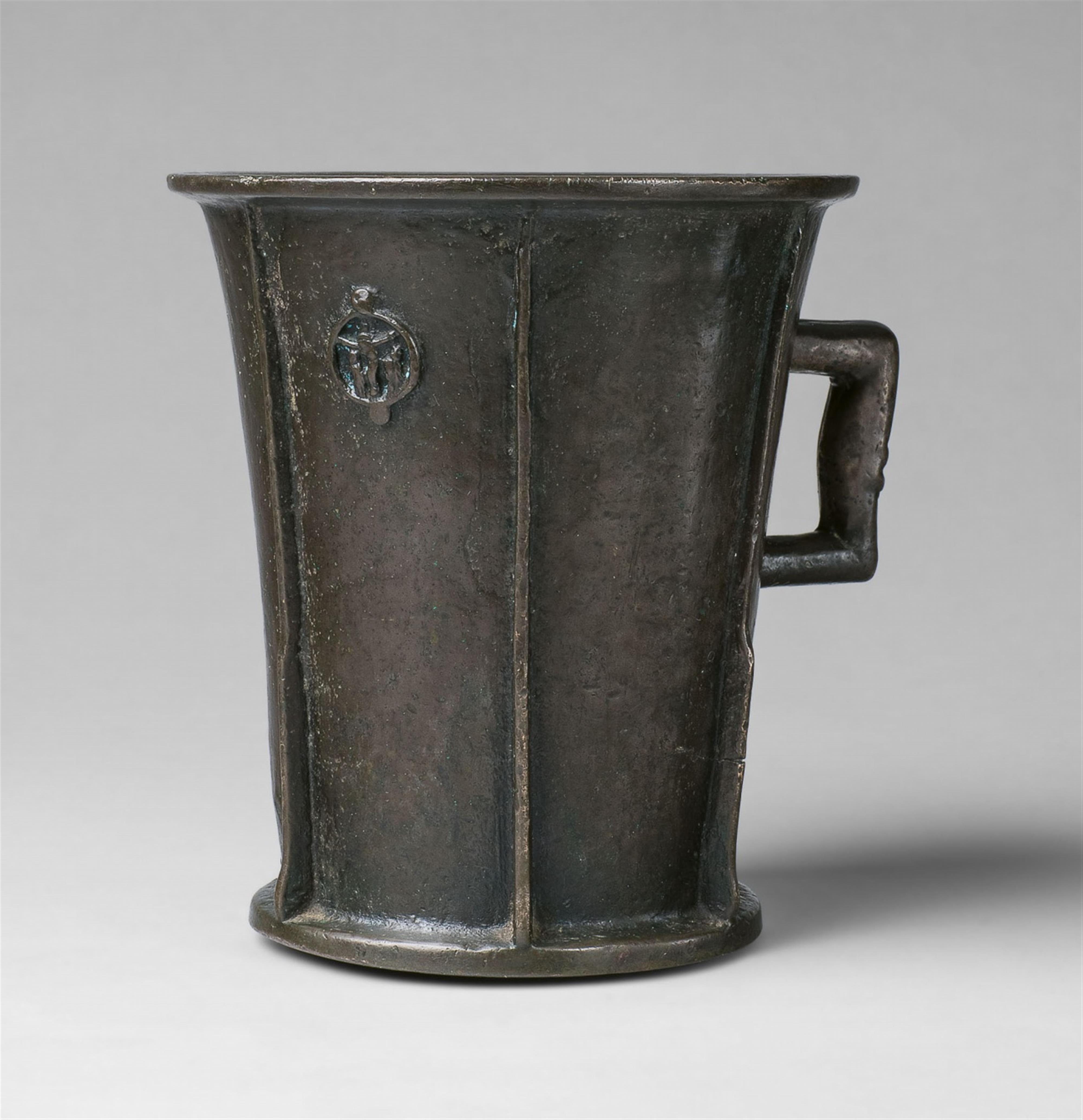 A rare one-handled mortar with a crucifixion motif - image-1