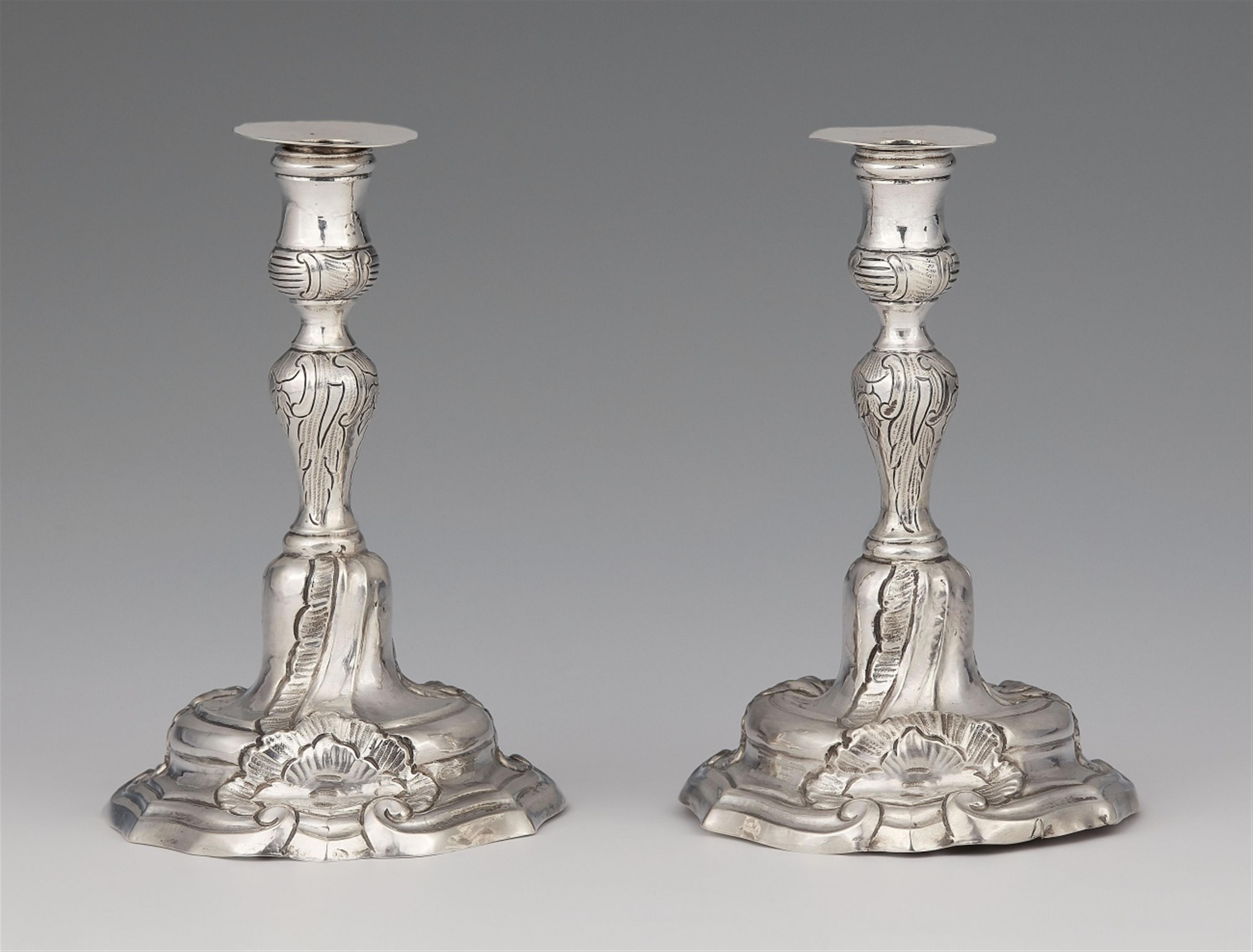 A pair of miniature silver candlesticks - image-1