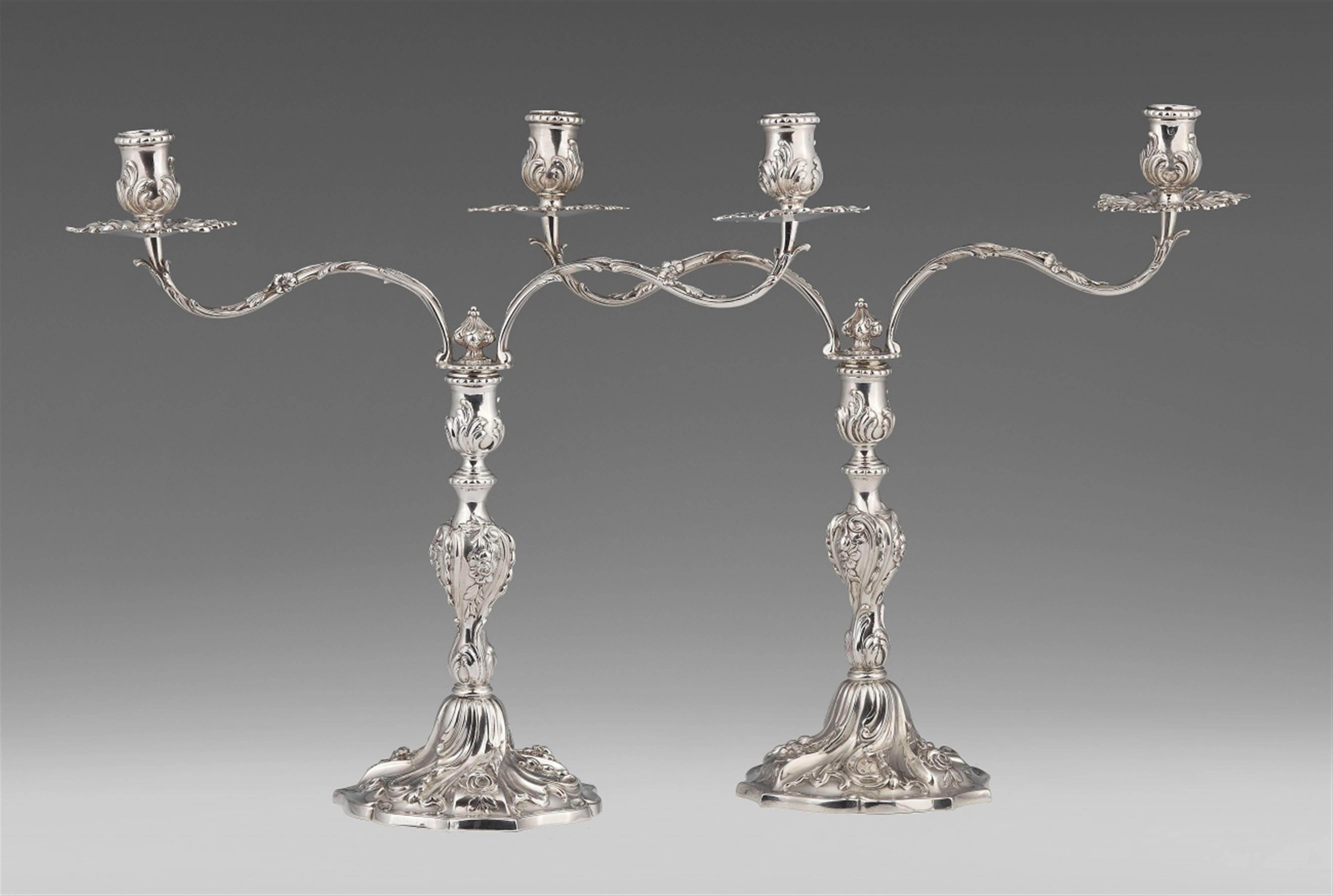 A pair of George II silver candelabra - image-1