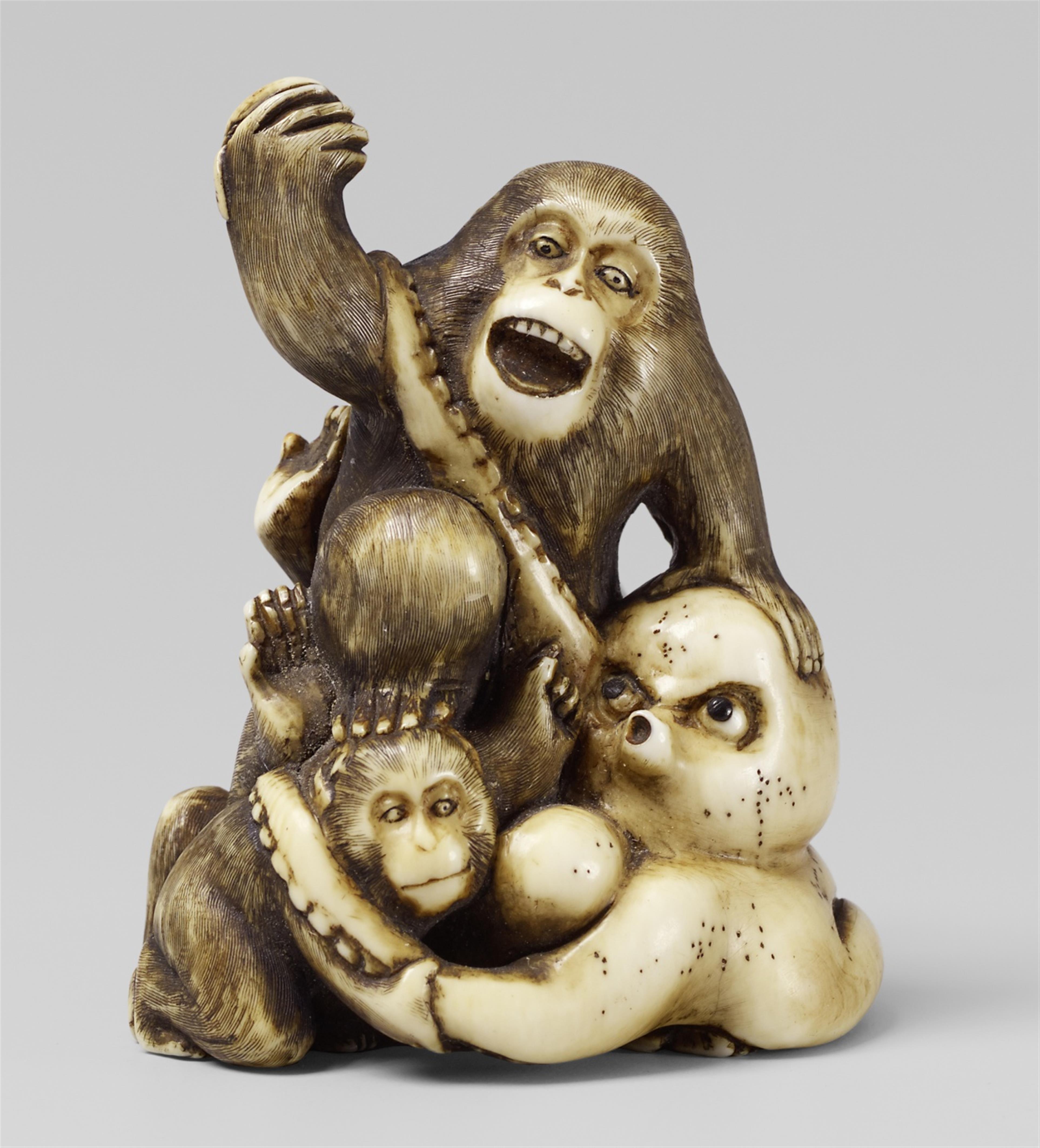 An ivory netsuke of a group of monkeys and an octopus. Second half 19th century - image-1