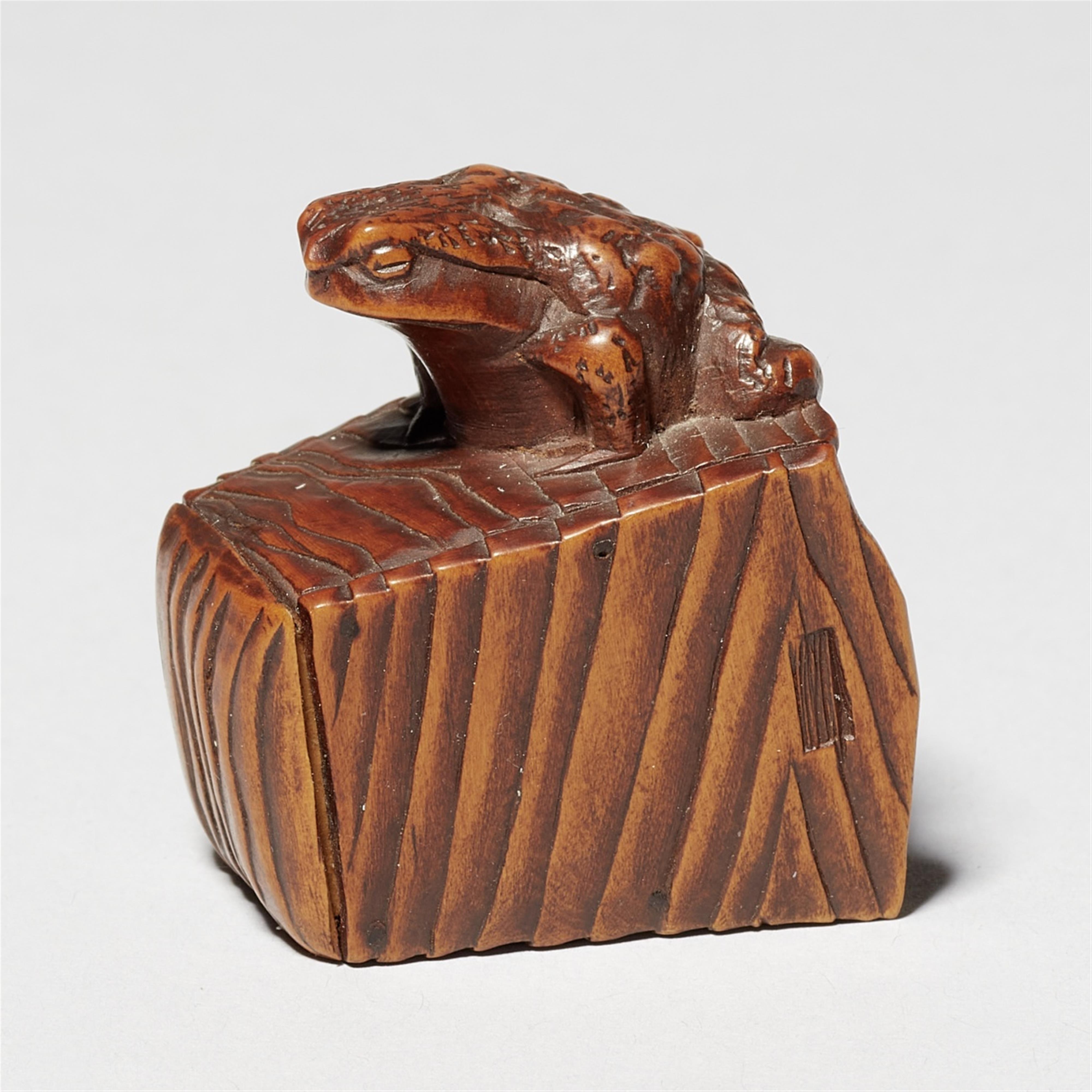 An Ise school boxwood netsuke of a toad on a bucket, by Masanao. Mid-19th century - image-1