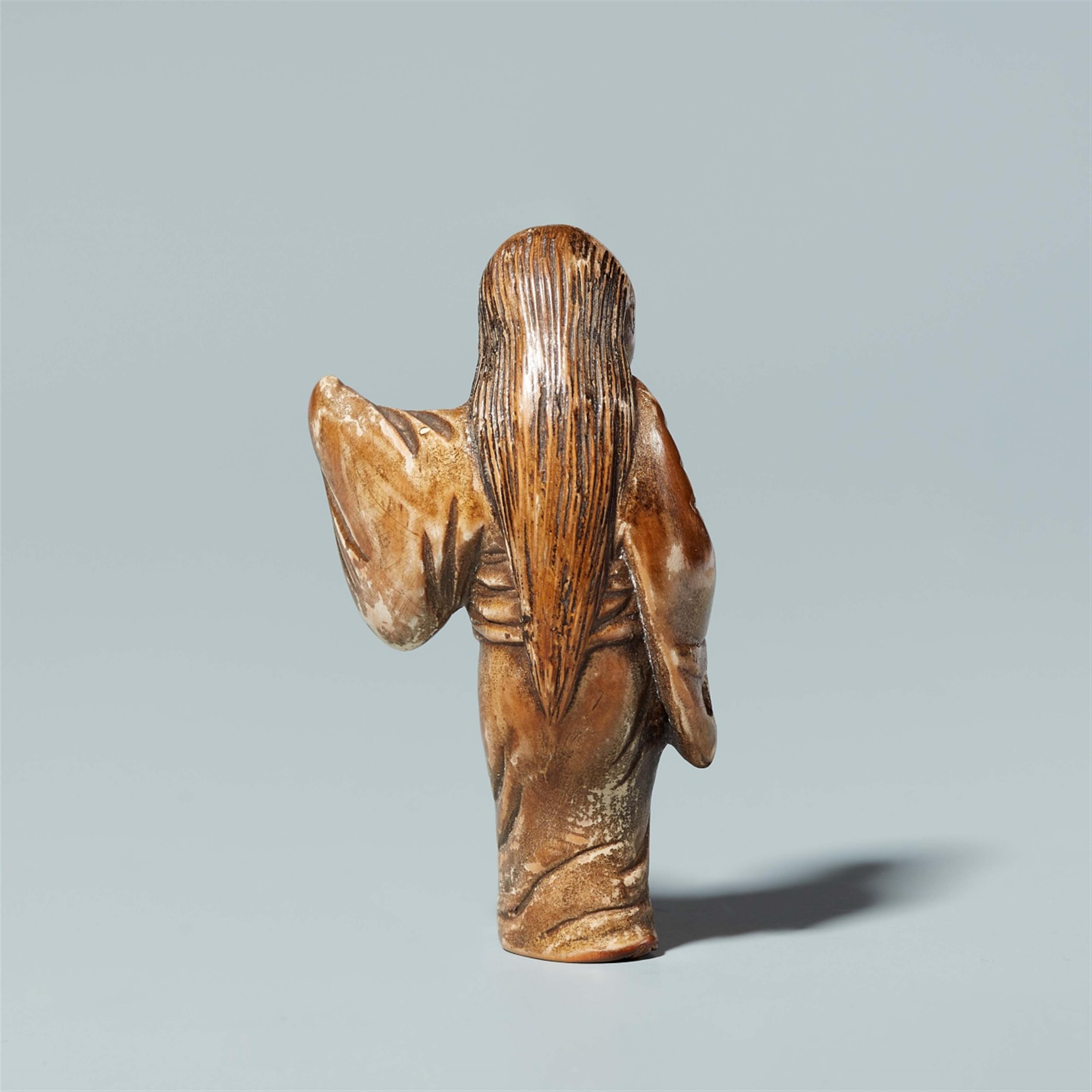 A wood and lacquer netsuke of a demon with a child. Late 19th century - image-3